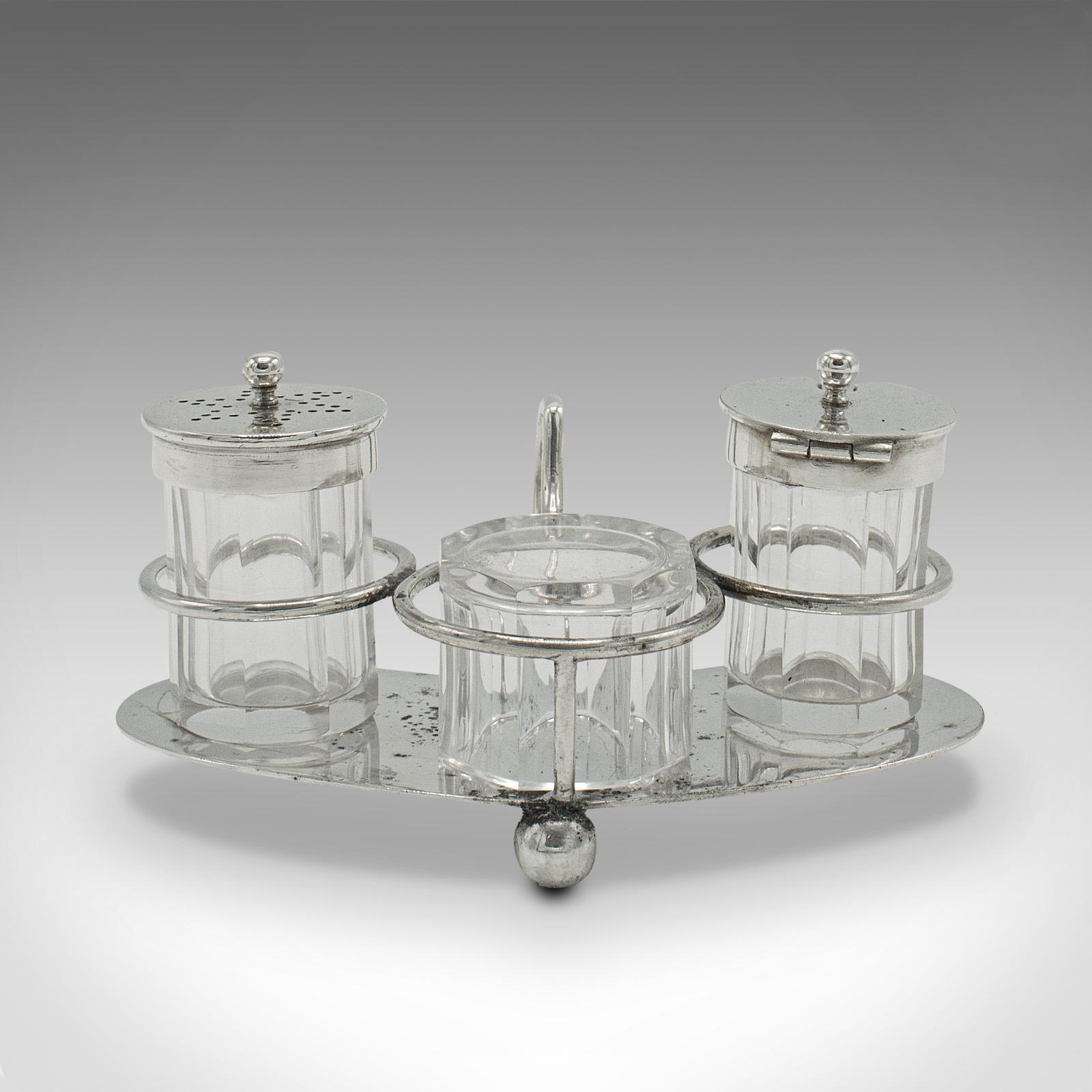 This is a cased set of antique cruets. An English, silver plate canteen of four condiment stands, dating to the Edwardian period, circa 1910.

Delightful tableware presented within an attractive case
Displays a desirable aged patina - some light