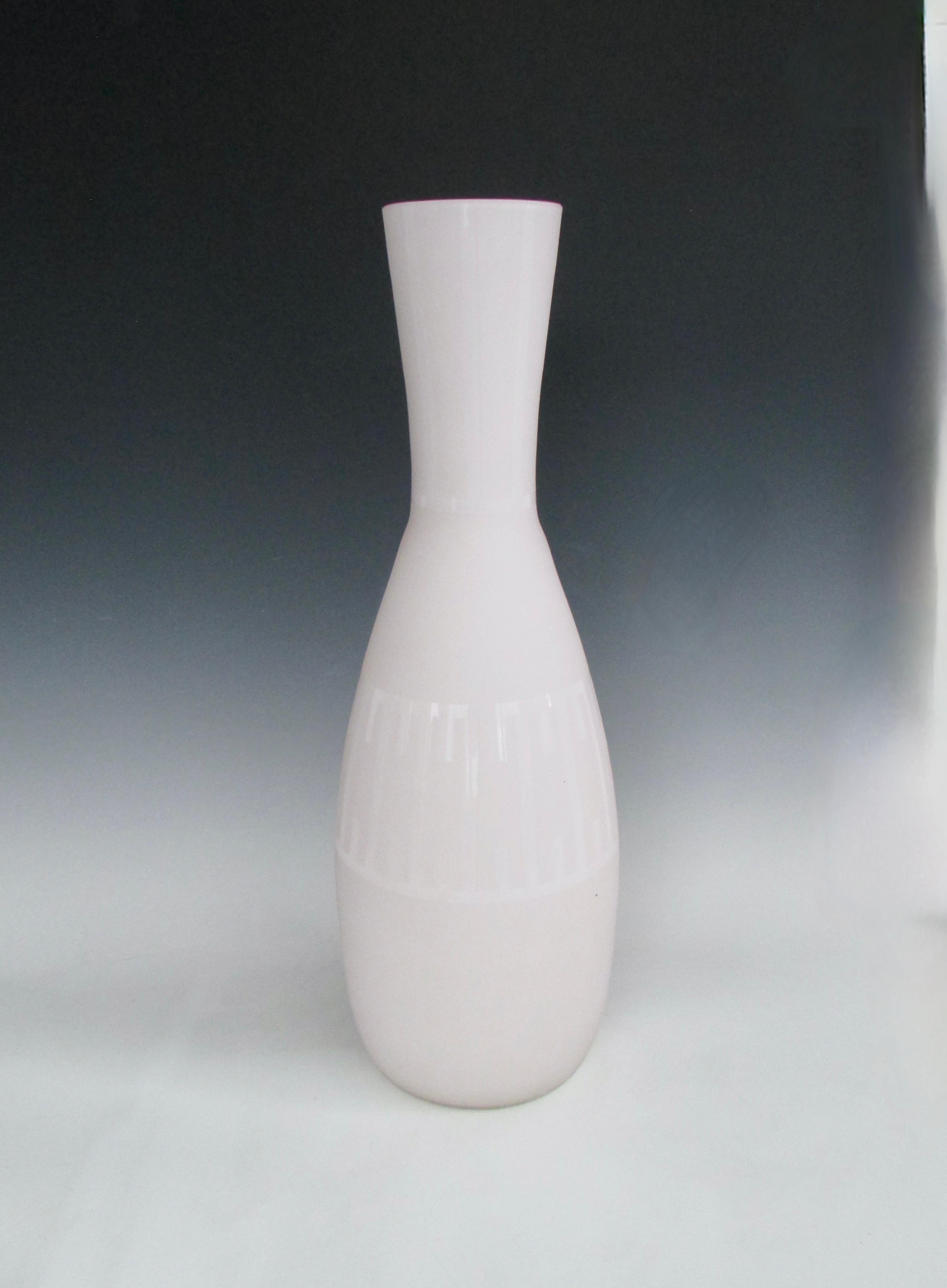 Tall cased glass floor vase in matte finish with gloss design.