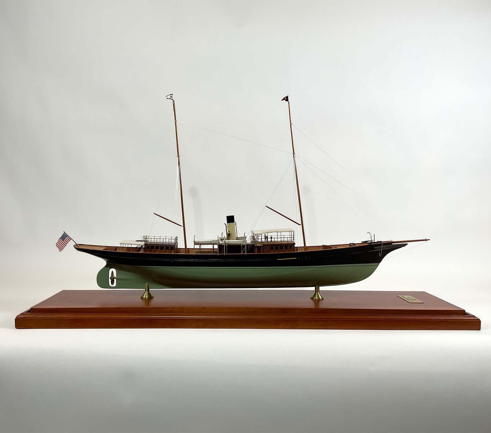 Model of the private steam yacht Golconda of Clarks Cove. Great scale model with hull painted black above the waterline and green below. Details include built up cabins, companionway, skylight, helm, binnacle, telegraph, etc.. Model was built by