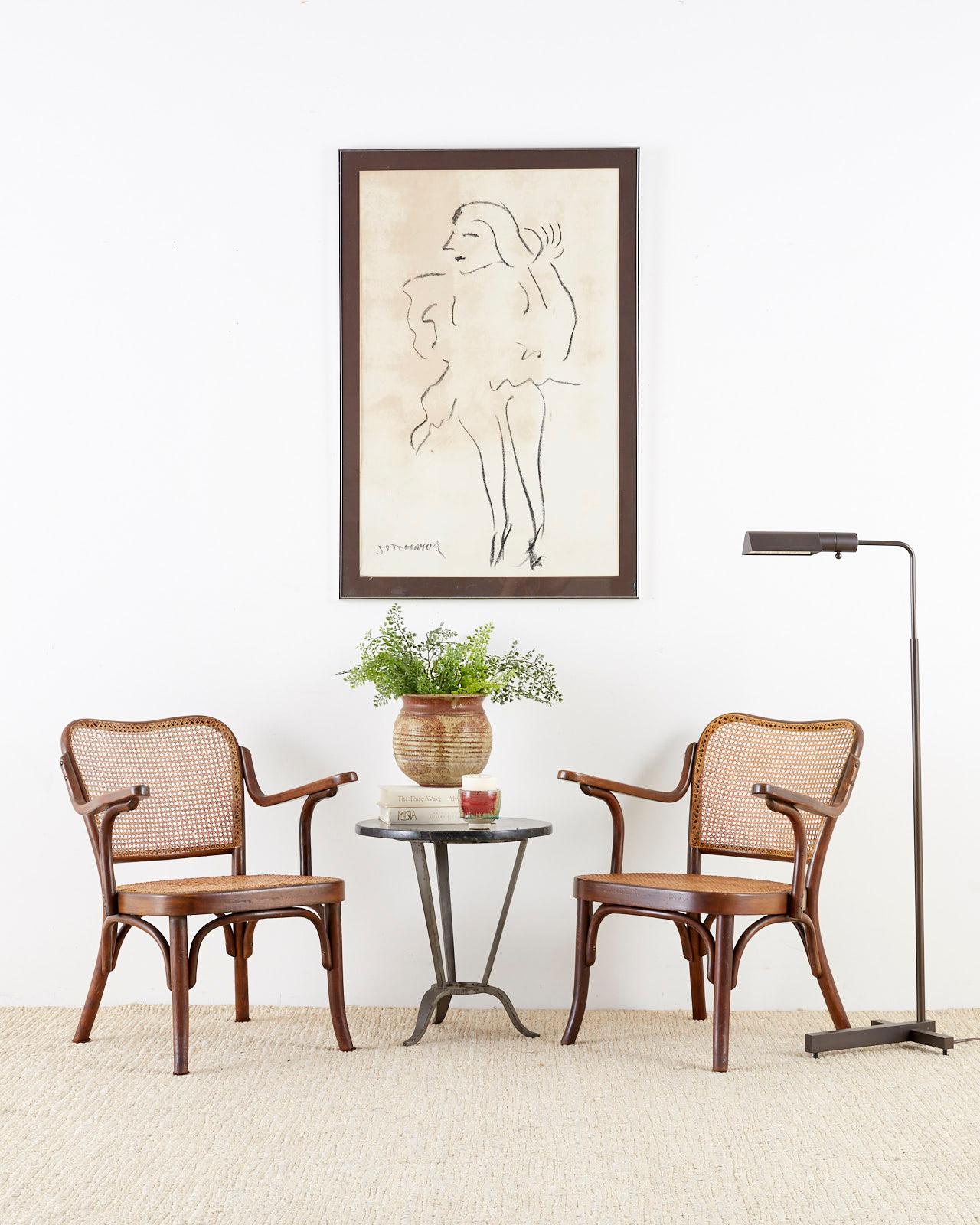 Modern style bronze adjustable height pharmacy floor lamp by Casella Lighting. Features a rare matte bronze finish and a T shaped base. Adjusts from 37 to 46 inches high with a shade that rotates 360 degrees. The lamp has a dimmer switch and is made