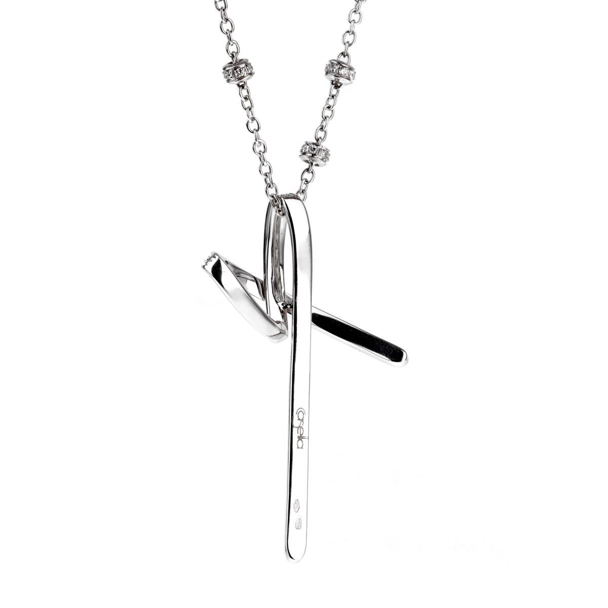 A fabulous cross necklace by Casella featuring .87ct of round brilliant cut diamonds set in 18k white gold. The pendant measures 1.14