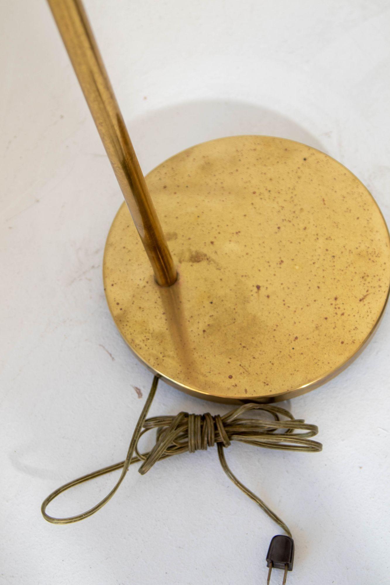 Articulating Brass Floor Lamp by Casella Lighting 1970.
Polished Brass floor lamps produced by Casella in San Francisco, CA. The lamps feature a large J-style shade in an 11 inch size. The large shade has a tilt, swivel rotation.
Mid-century modern