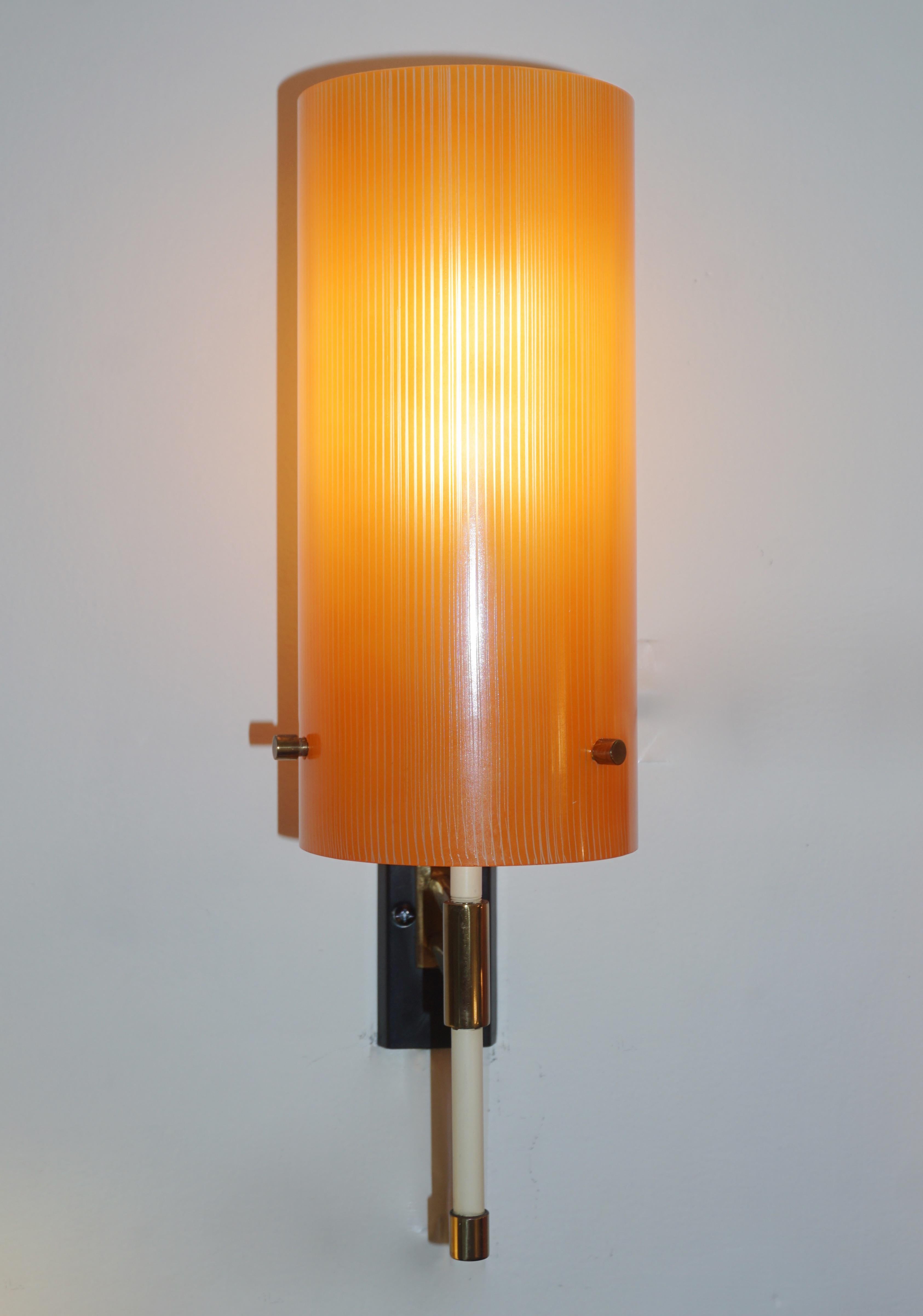 Rare Mid-Century Modern pair of glass sconces, entirely handcrafted in Italy by Casey Fantin, Florence, a wonderful example of Minimalist midcentury Italian design. High quality of manufacturing with slender cylindrical frosted glass shades (9.5 in.