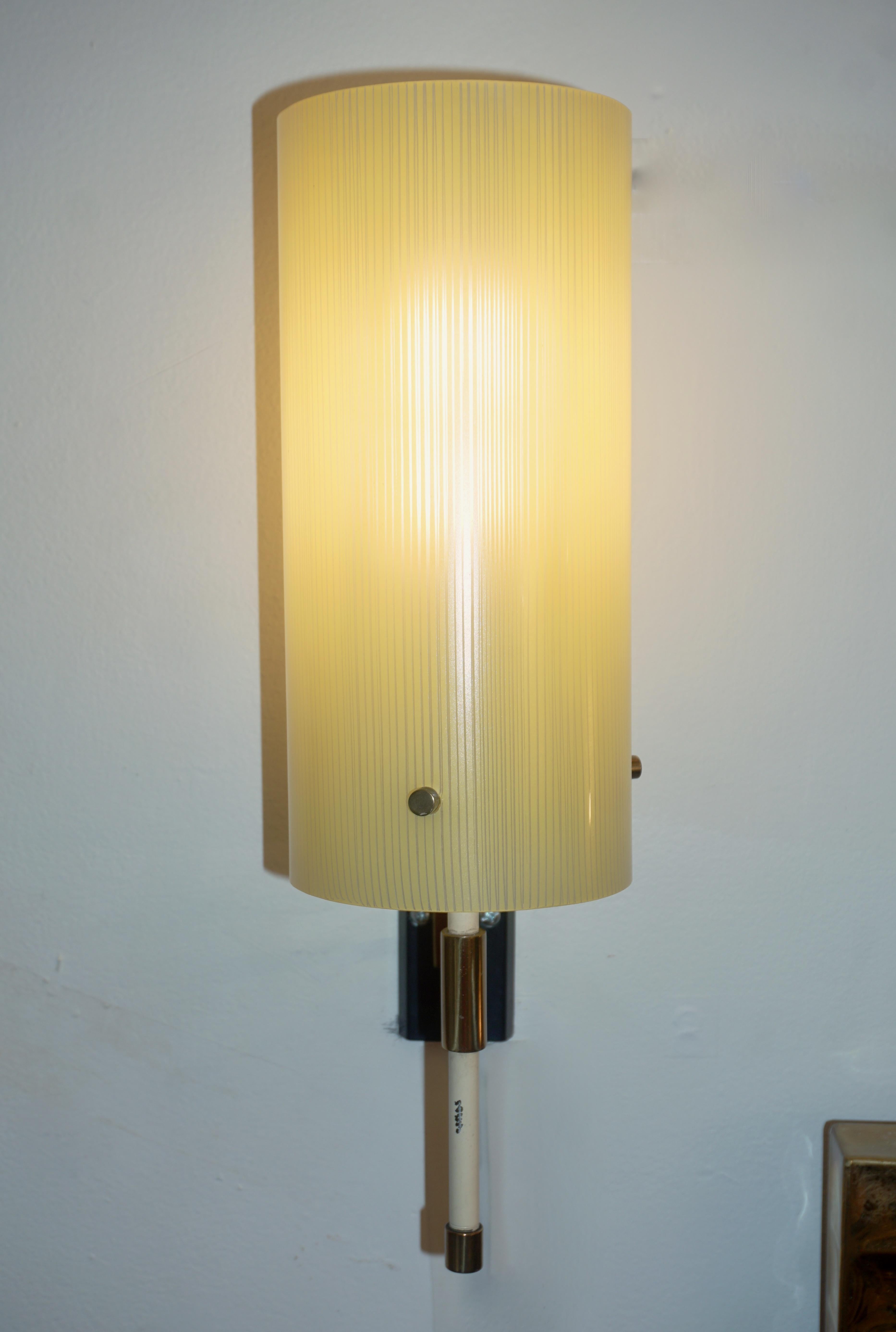 Rare Mid-Century Modern pair of glass sconces, entirely handcrafted in Italy by Casey Fantin, Florence, a wonderful example of Minimalist midcentury Italian design. High quality of manufacturing with slender cylindrical frosted glass shades (9.5 in.