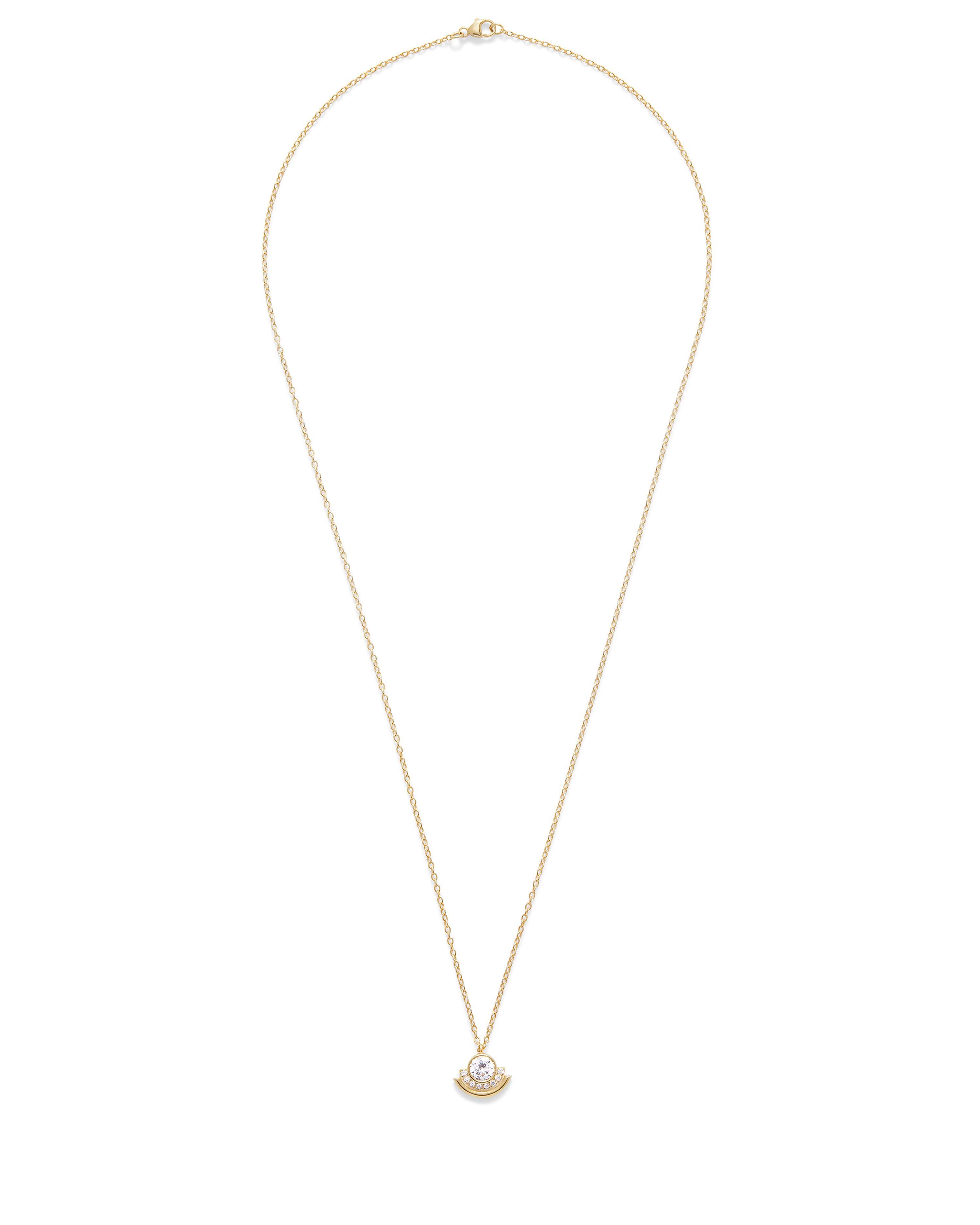 This architectural yet minimal arc shaped 14K gold charm is ready to slip onto your favorite chain. It features a large bezel set diamond surrounded with modern banded detail. Its petite size makes it suitable for everyday wear or layering with your