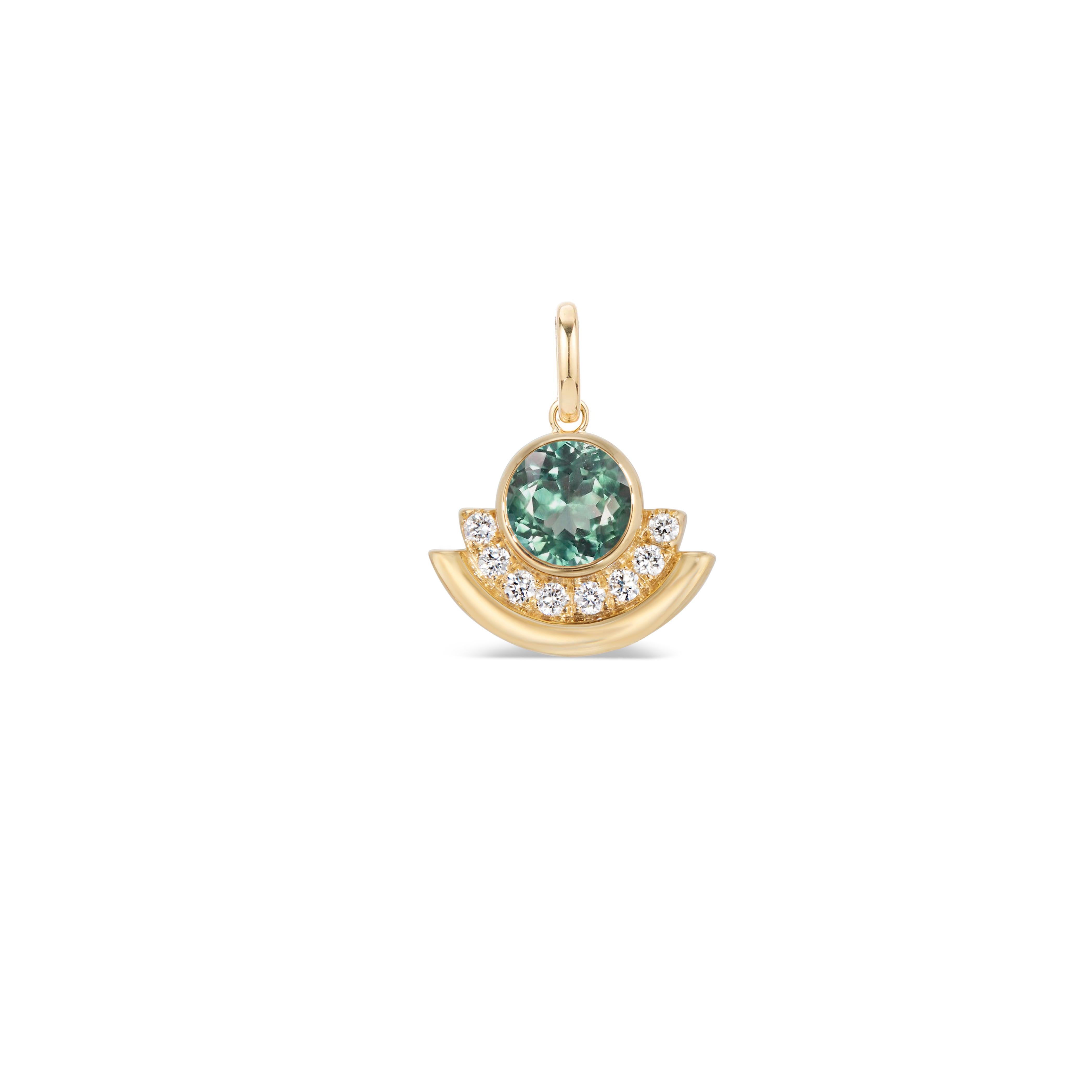 This architectural yet minimal arc shaped 14K gold charm is ready to slip onto your favorite chain. It features a large bezel set green tourmaline accented with modern banded detail and diamond pave. Its petite size makes it suitable for everyday