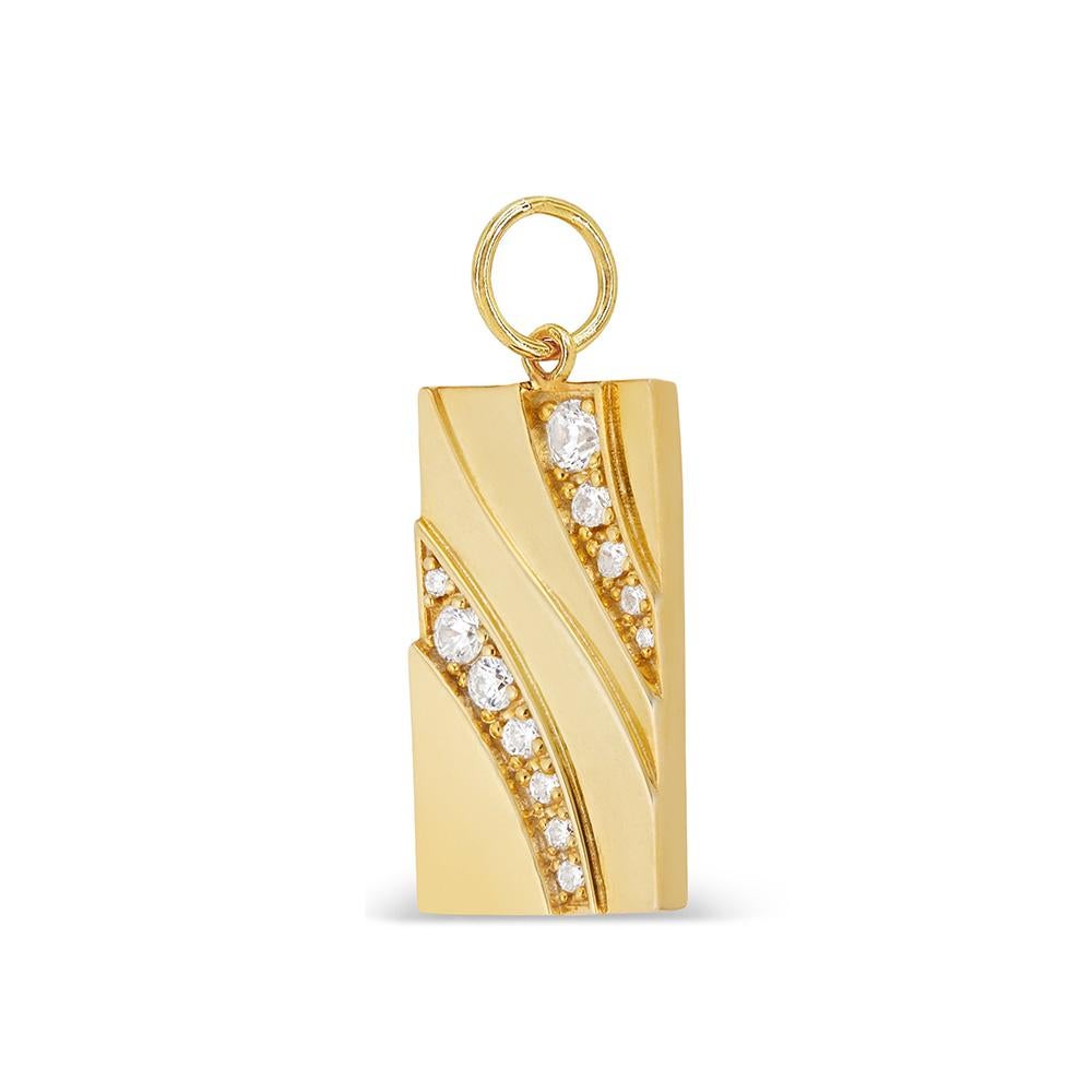 This recycled yellow gold rectangular charm features a sculptural tiered design set with brilliant cut diamonds. The charm comes attached to a gold ring which allows you to slip it onto your favorite chain with other charms. Part of the Tierra Nueva