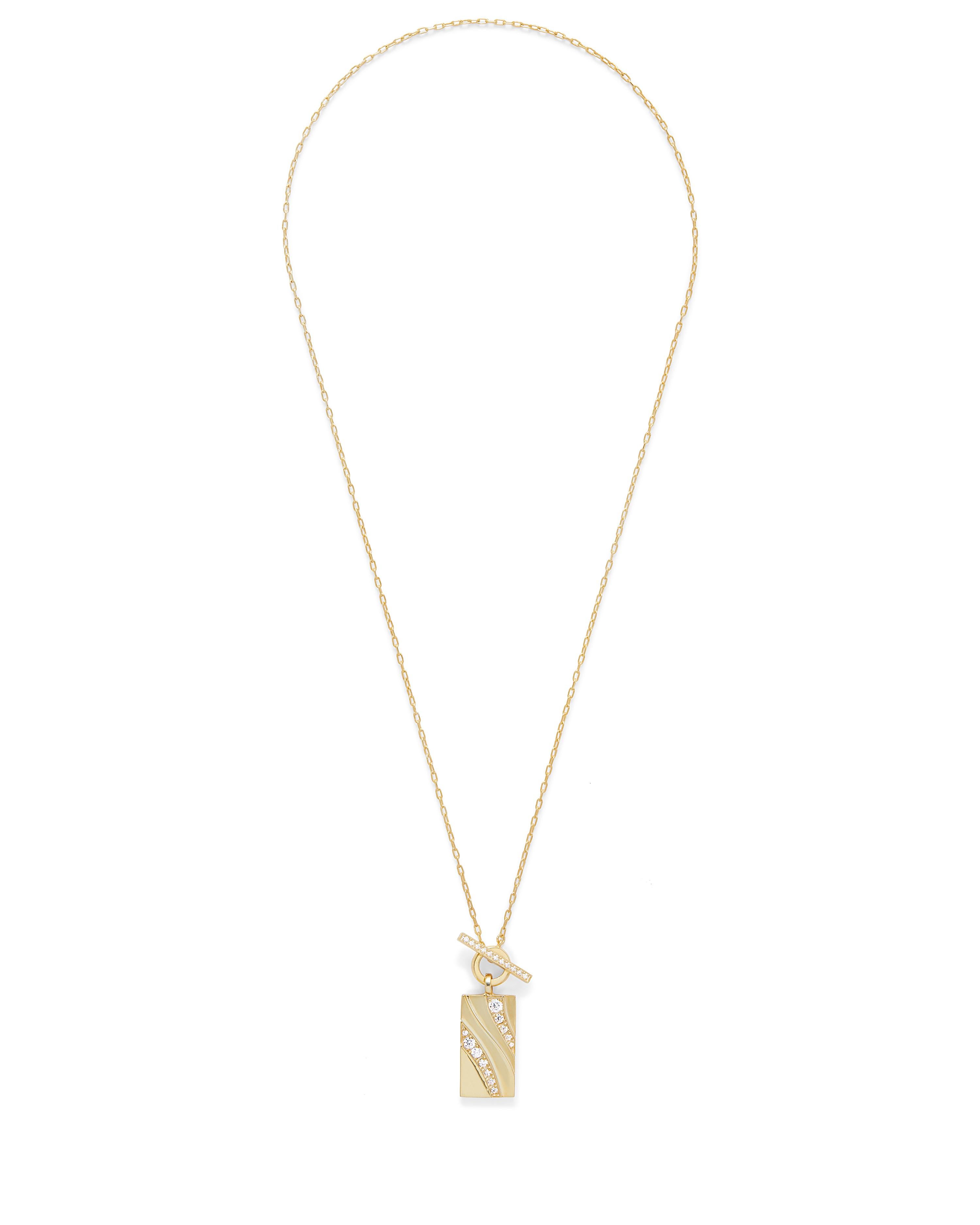 Rectangular pendant with graceful curving lines and tiered detail accented with pave diamond. The necklace features a toggle style closure with pave diamonds. Total diamond weight is 1.6 carats. The chain length is 18
