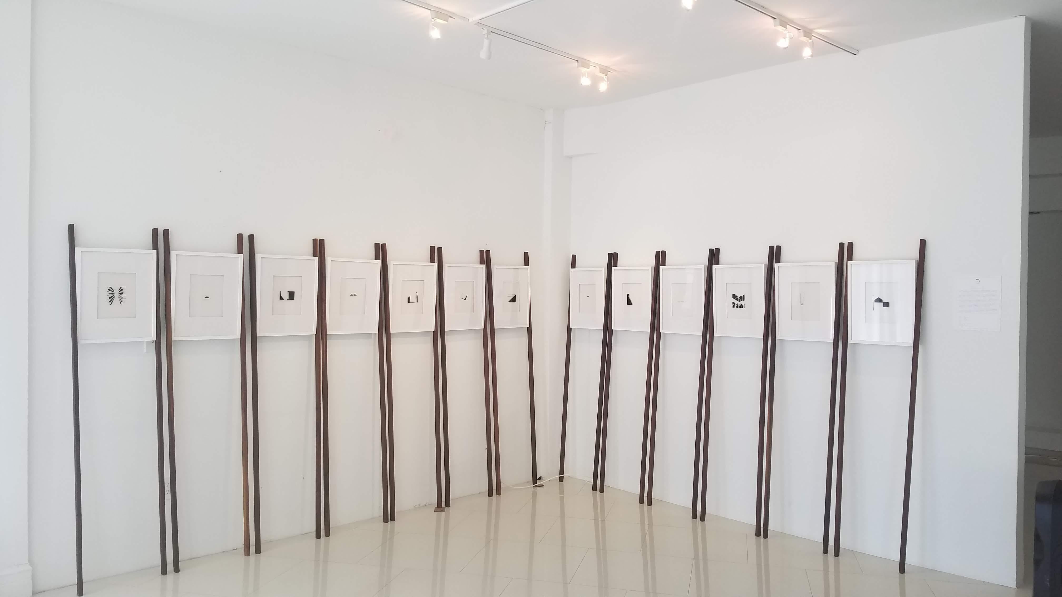 Wood, 2018 by Casey Waterman
Plaster, Glass, Vinyl, Walnut
One of a kind art wall installation of 16 pieces. 
Overall size: 72