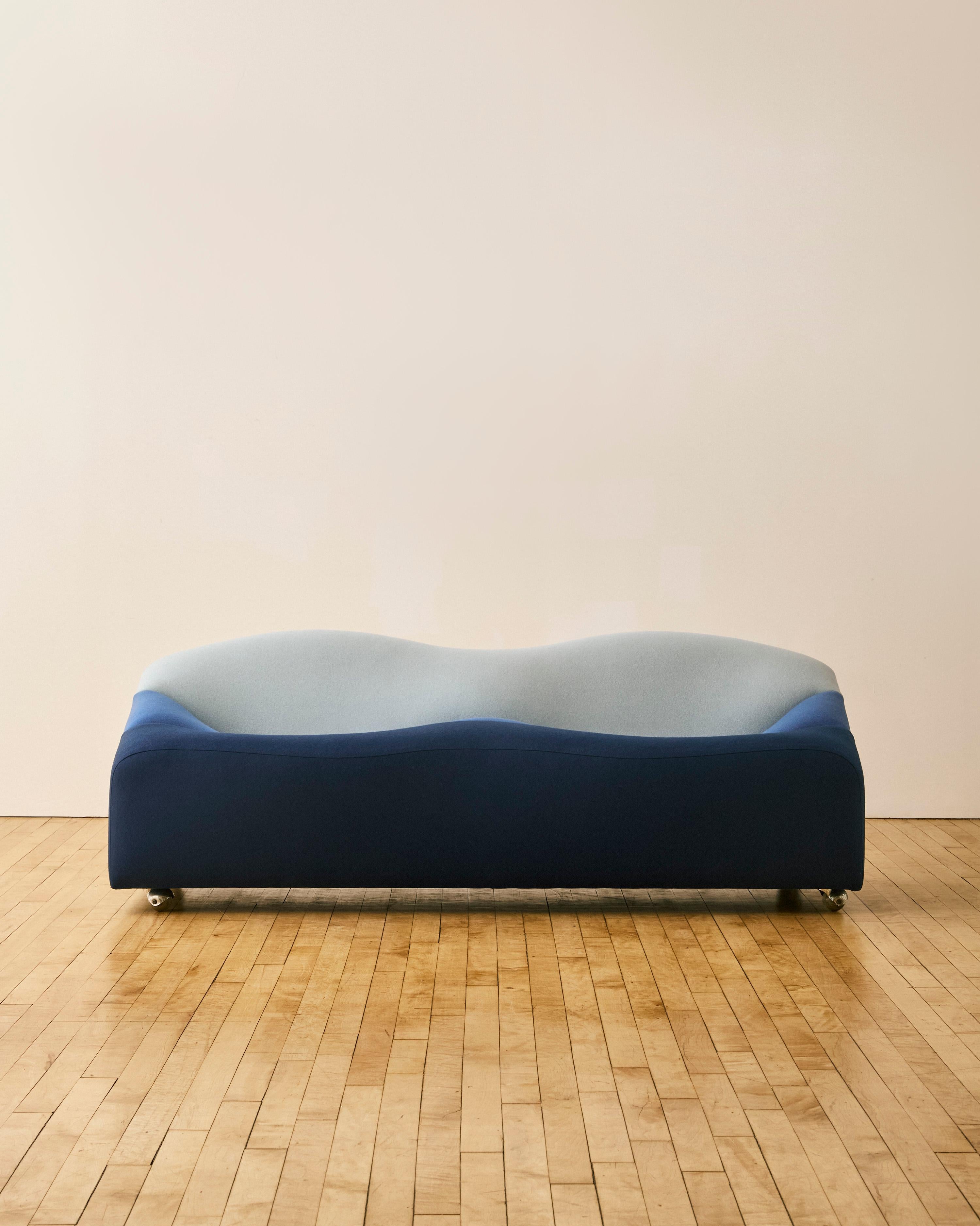 Three shades of blue 'ABCD' cashmere two-seater sofa by Pierre Paulin for Artifort on metal casters.
