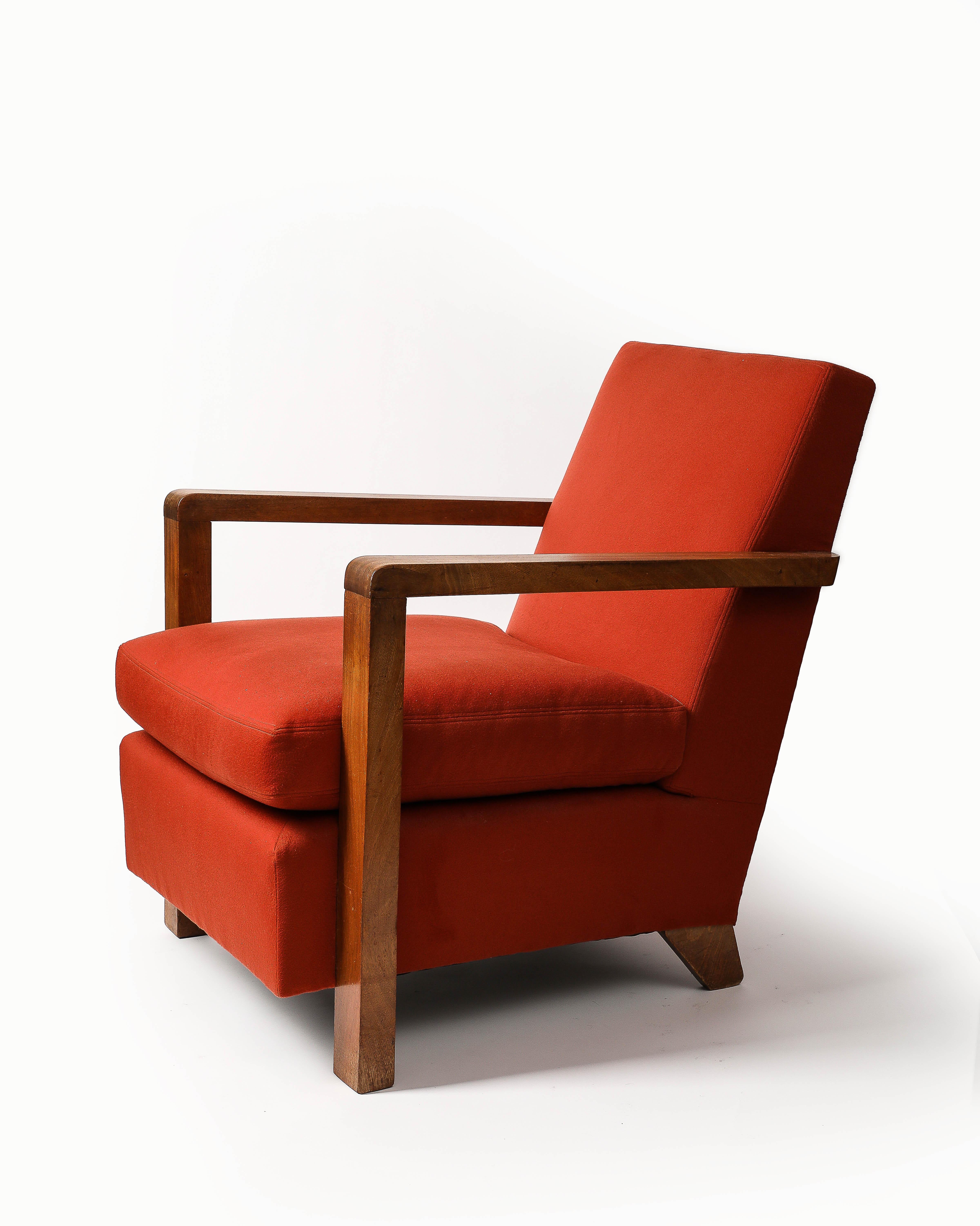Armchair with red cashmere upholstery with mahogany frame.