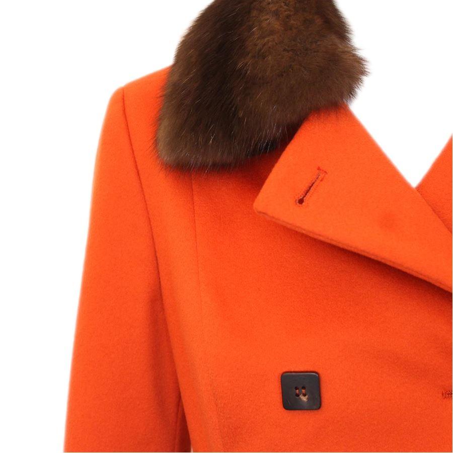100% Cashmere Orange color Chinchilla collar (removable) 3 Buttons 2 Pockets Length shoulder/hem cm 100 (39.3 inches) Shoulders length cm 40 (15.7 inches) Original price euro 4700

