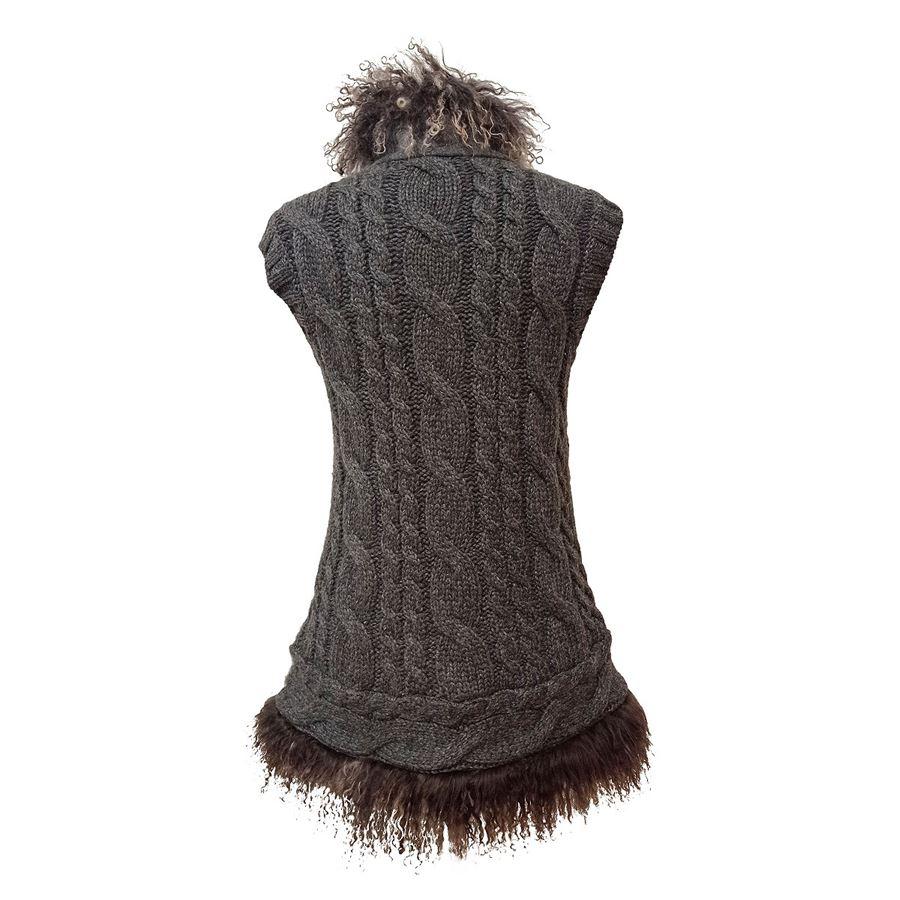 Cashmere Dark grey color Braided Mongolian fur inserts on neck and bottom Zip closure

