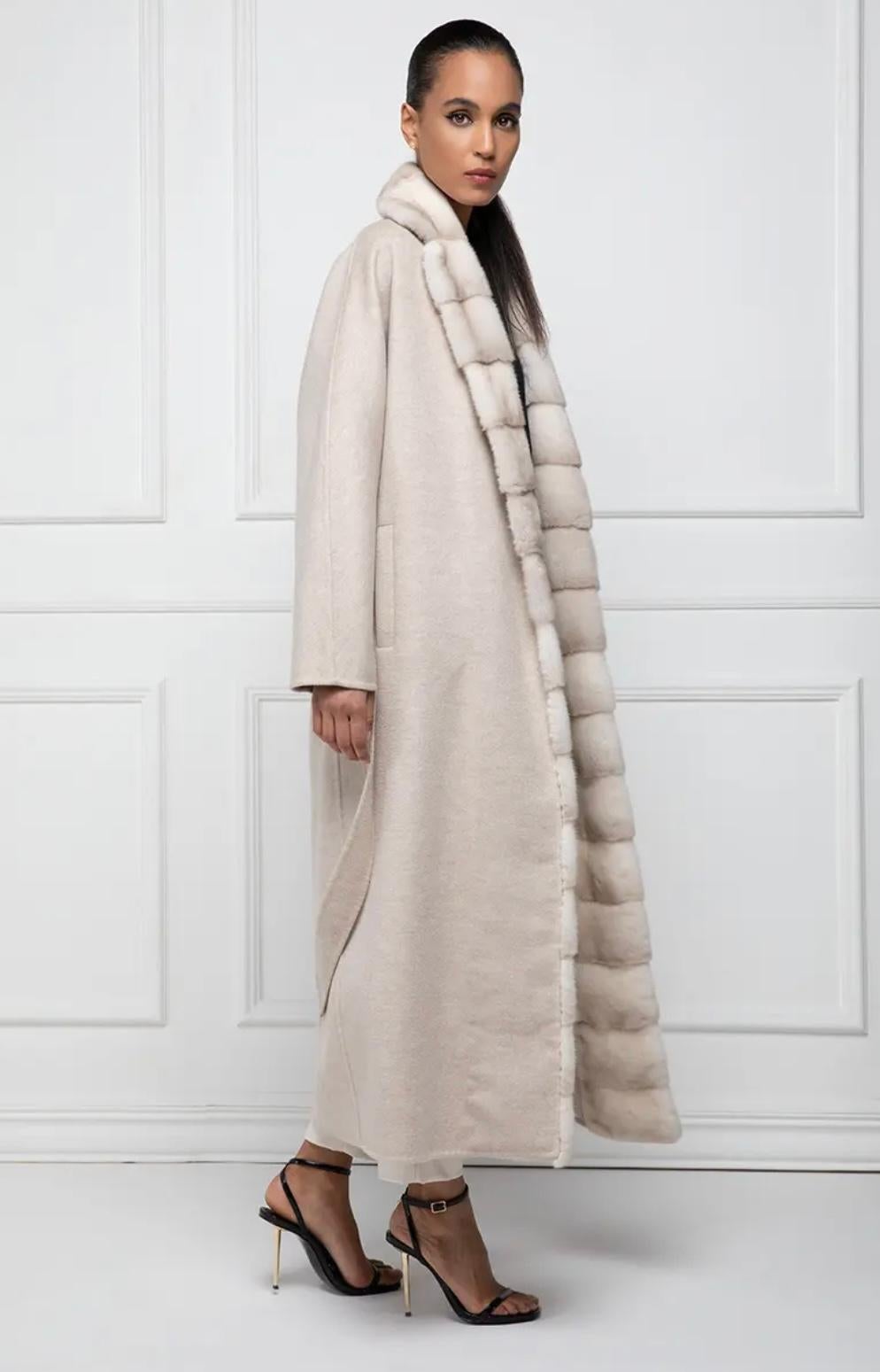 Cashmere Loro Piana with mink and whole skins. Also this Mink Fur, as the most part of the collection, is made using selected female mink carefully chosen by our laboratories. The type of mink fur used for this natural mink is Danish, precisely from