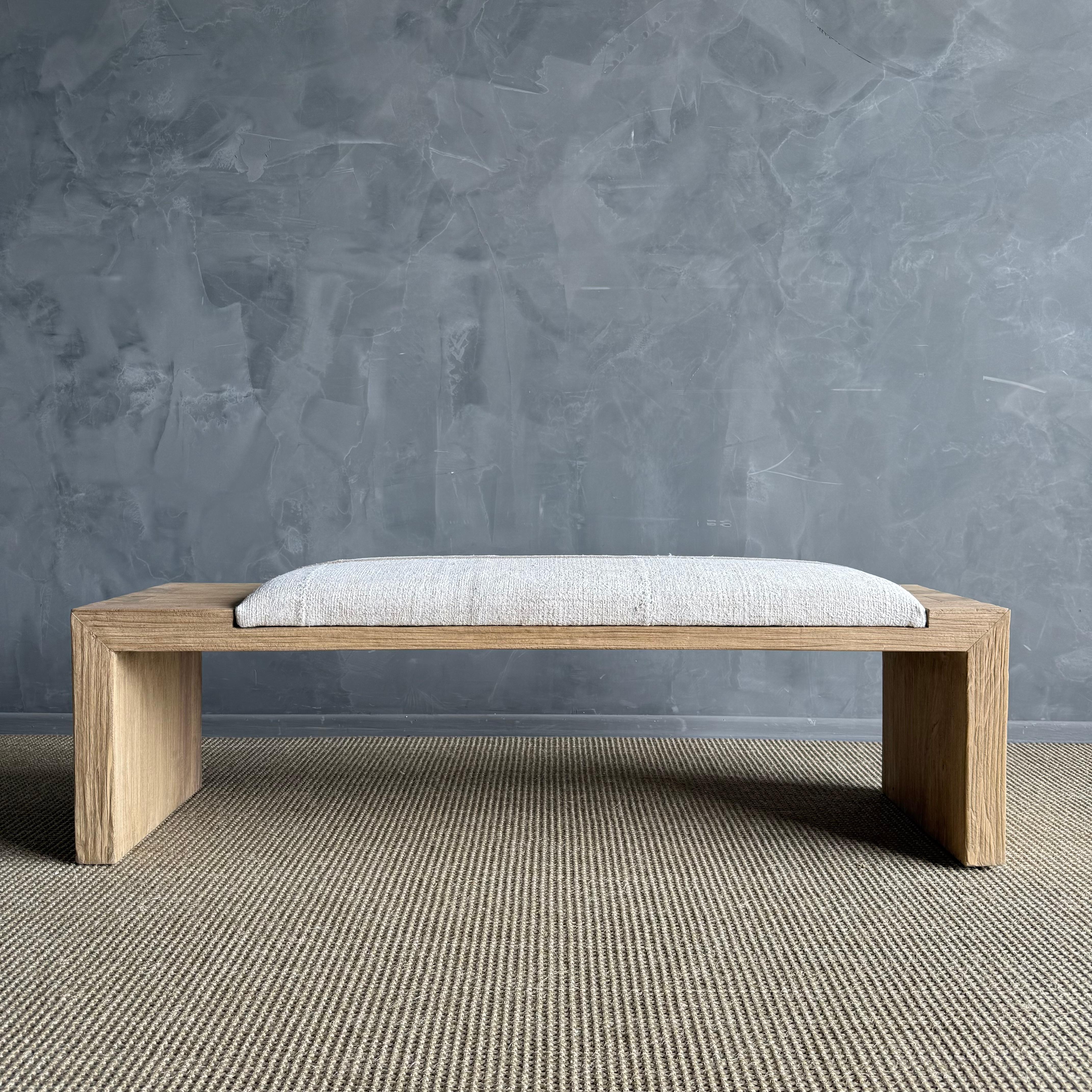 The Casi Elm Bench 
The artisanal construction methods highlight the elm woods beautiful grain pattern & knots and fissures from its past life. The most authentic materials are hand selected, and hours of hand-craftsmanship go into each piece,