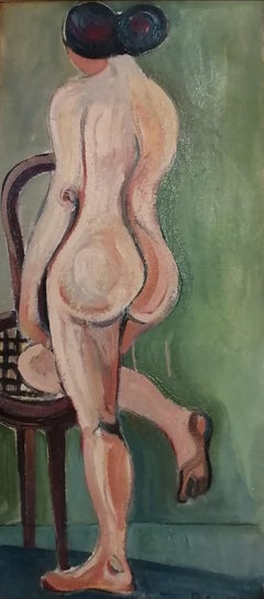 Nude woman in chair