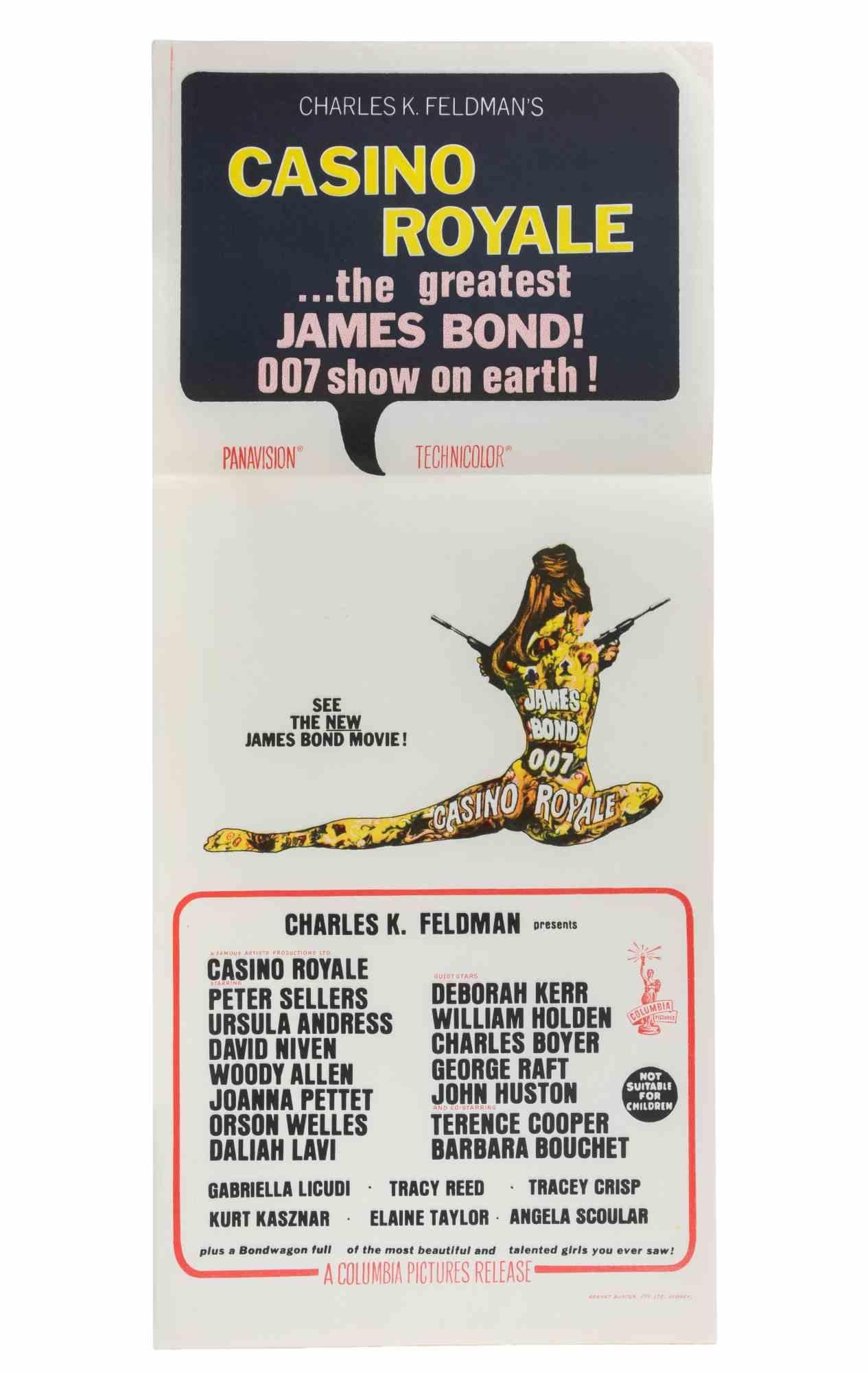 Australian Daybill (ca. 76 × 33 cm), Columbia Pictures.
Regie: John Huston u.a., in den Hauptrollen Peter Sellers, Ursula Andress, David Niven und Woody Allen. Kunstwerk von Robert McGinnis, das die kultige tätowierte Frauenfigur zeigt. Gefaltet.