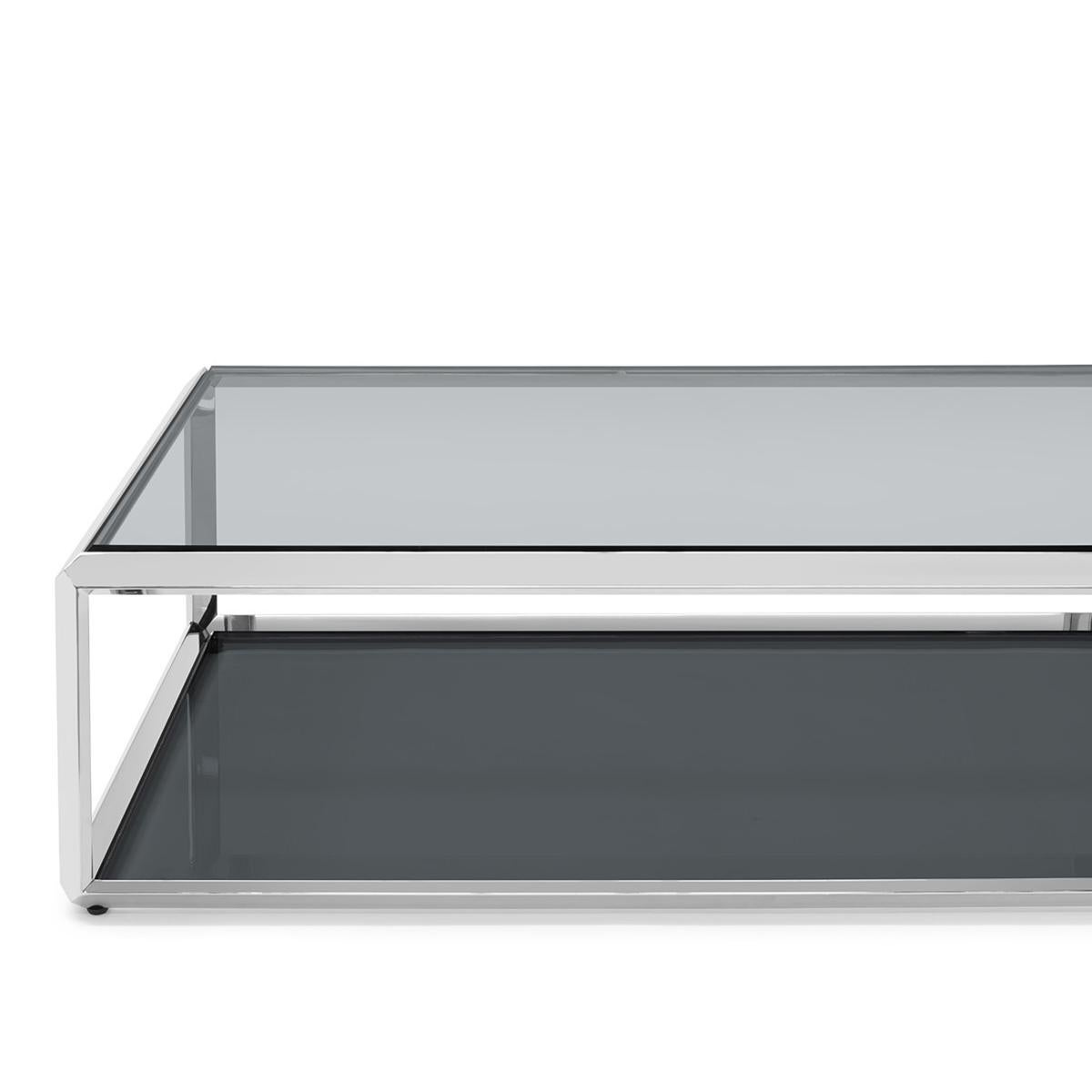 Coffee table Casiopee chrome with structure in chrome finish,
with beveled smocked glass top up and down the coffee table.