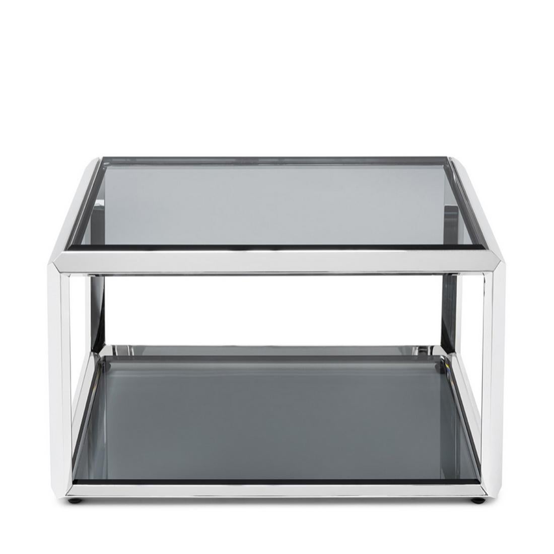 Table d'appoint Casiopee chromée avec structure en finition chromée,
avec un plateau en verre biseauté smocked en haut et en bas de la table basse.