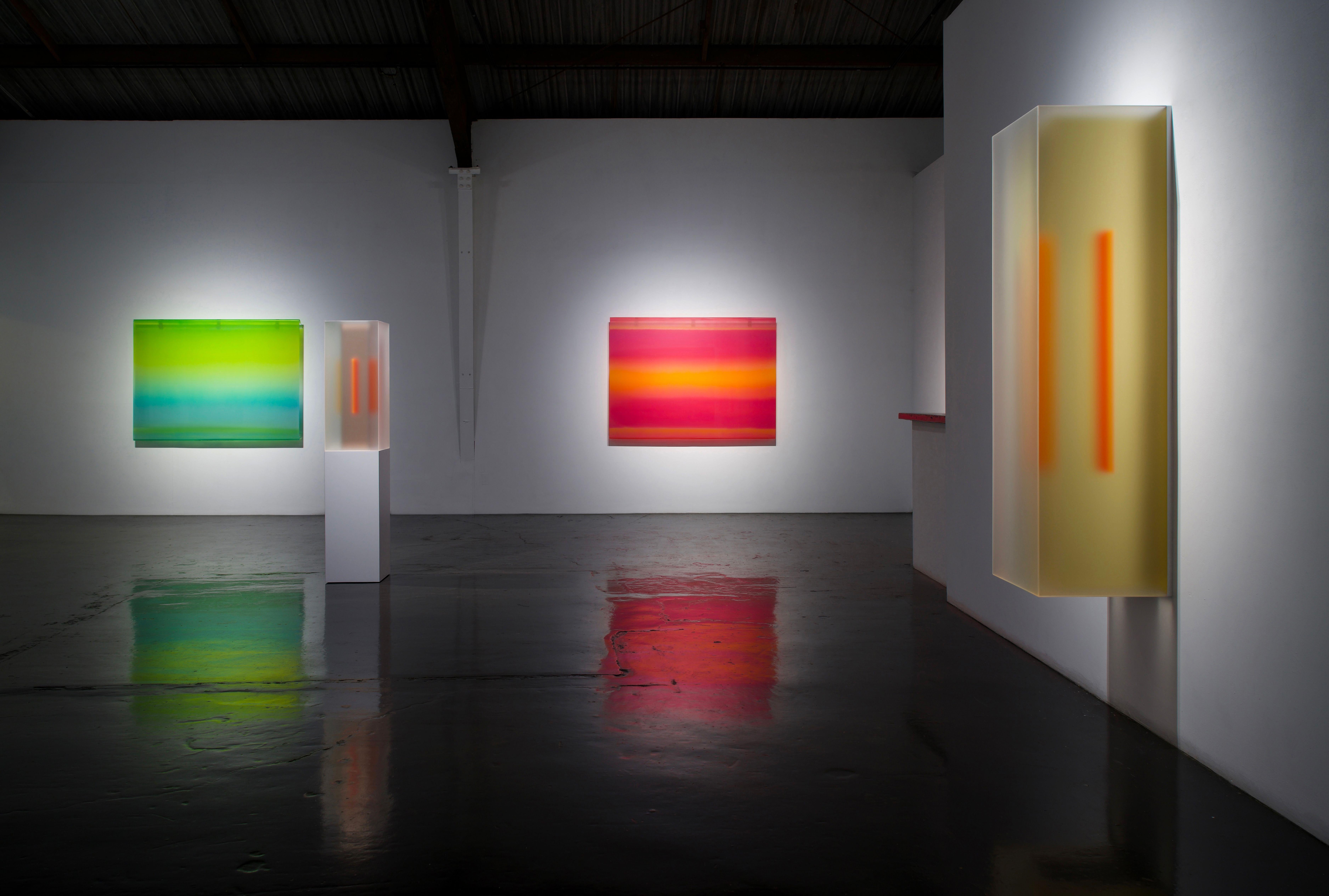 The Veils introduce Brindle’s newest series, where diaphanous washes of color float on elegantly suspended sheets of acrylic. Painted in layers from the back of these sleek, crystalline surfaces, the paintings are bold and captivating. For Brindle,