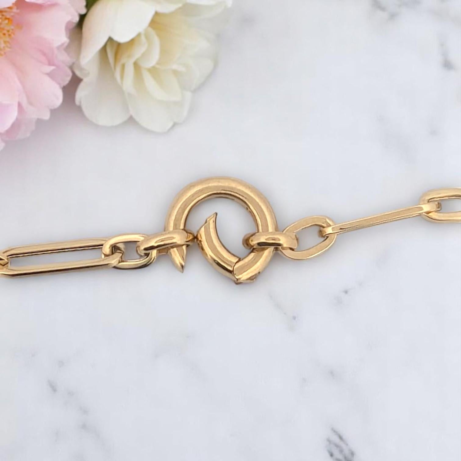 Handcrafted in 14k yellow gold, this 18-inch necklace features an artful combination of oval and bead links for subtle texture and movement. Perfect for:

Layering with pendants or wearing solo

Everyday luxury that elevates any outfit

Thoughtful