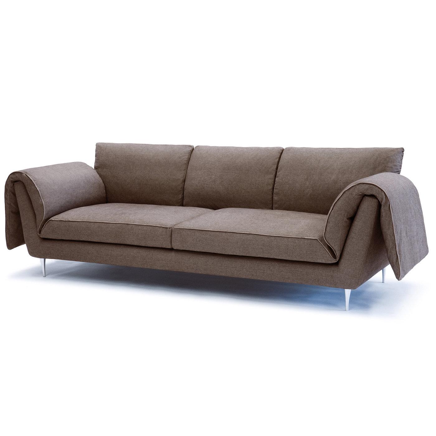 Evoking the clean and minimal lines of midcentury design, this sofa will make a statement in a modern living room. This convertible piece exudes comfort and style in a silhouette characterized by a striking arm design and a well-balanced frame