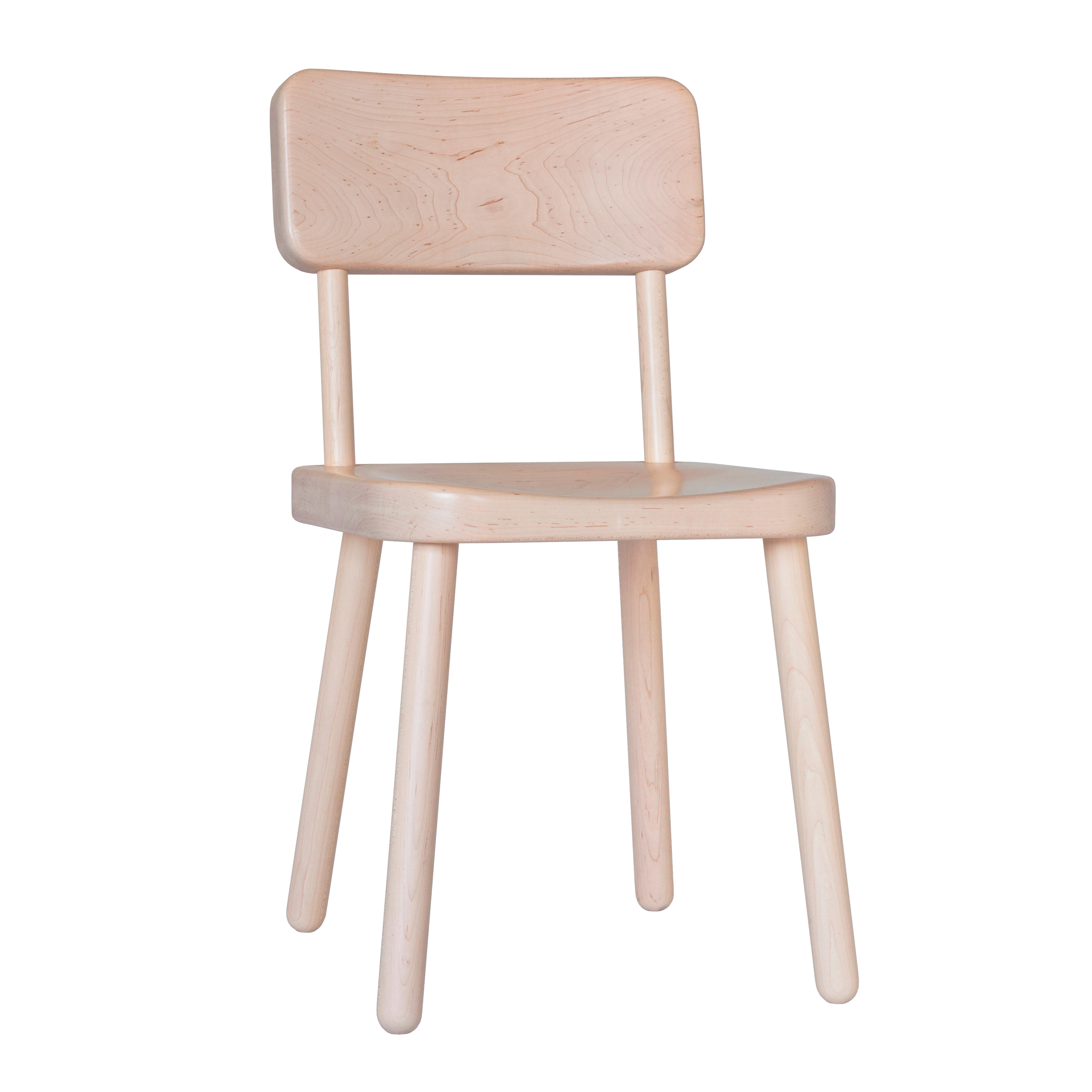 Cass Chair is made of solid maple with a polyurethane finish. The minimal form is both sturdy and soft. The seat and back are sculpted with a CNC machine for comfort and are thick enough to enable strong joinery in the fewest amount of parts.