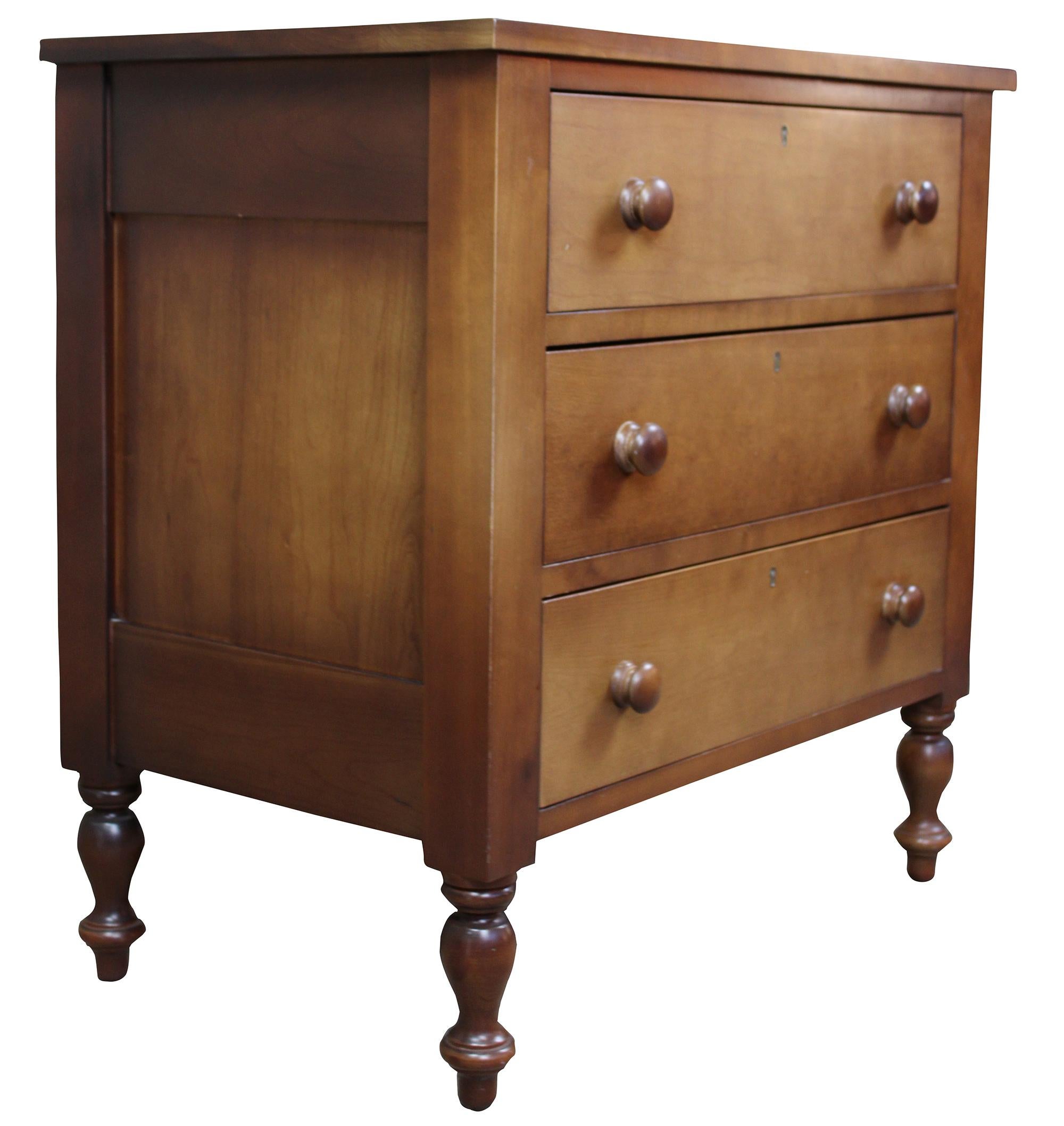 Vintage Cassady Furniture Co solid cherry dresser, chest or nightstand. An Early American reproduction featuring three dovetailed drawers. Cassady Furniture is out of bowling green kentucky, circa 1980s.
  