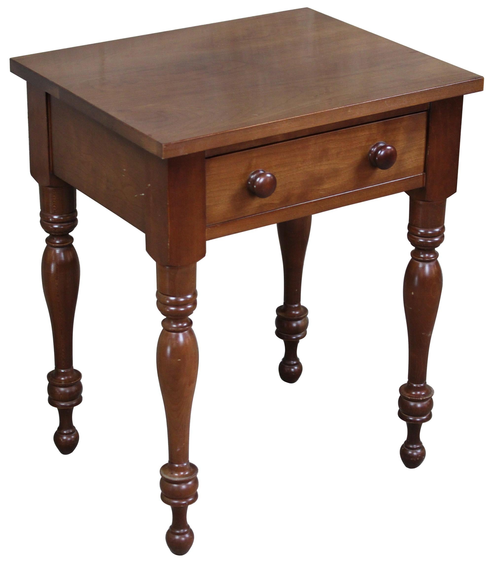 Vintage Cassady Furniture Co solid cherry side table. An early American reproduction featuring one dovetailed upper drawer. Cassady Furniture is out of bowling green Kentucky, circa 1980s. Measure: 27