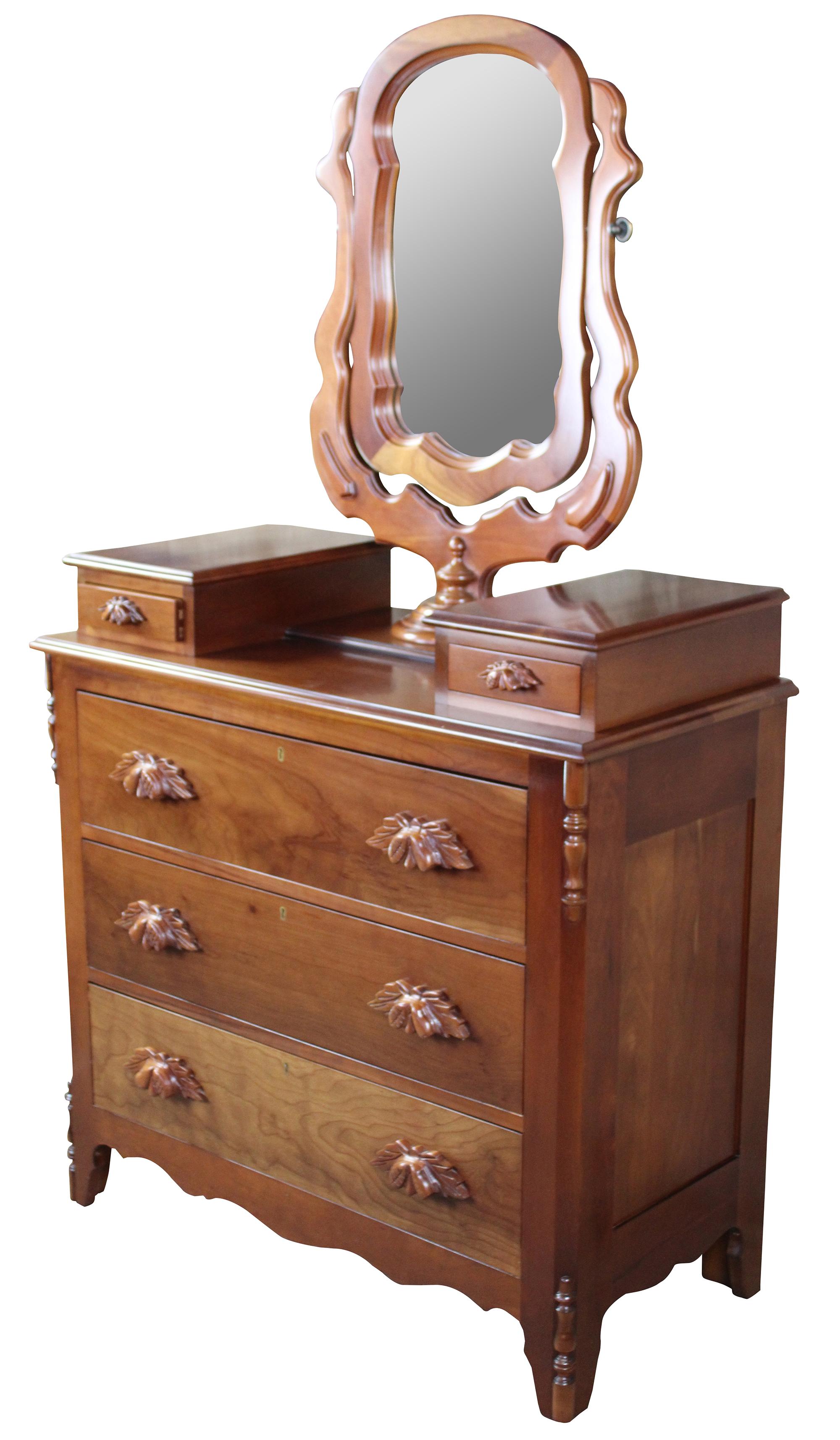 Vintage Cassady Furniture Co solid cherry Victorian dresser with wishbone mirror. A Victorian reproduction featuring three dovetailed lower drawers, two glove boxes and a swivel vanity mirror. Cassady Furniture is out of Bowling Green Kentucky,