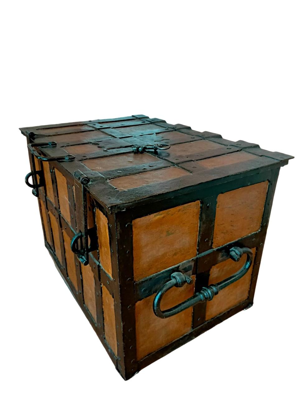 Antique chest safe from the 17th century, made of wrought iron.

Antique wrought iron safe chest from 1600, studded, with working mechanism
For key insertion there is a dungeon mechanism with snap. 
Coming from northern Italy (Trieste)
Restored and