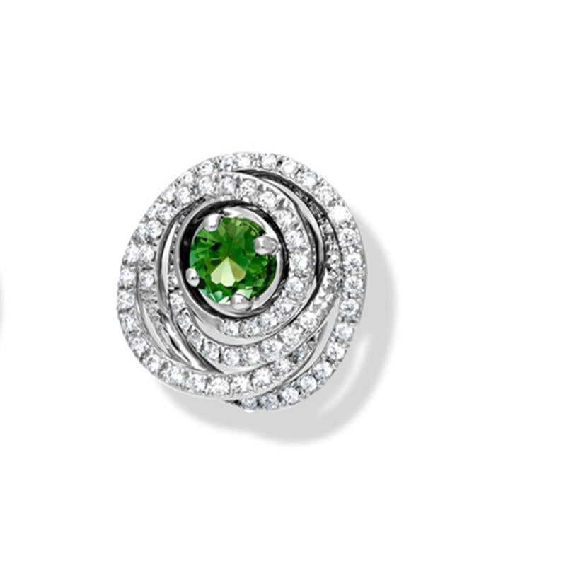 Agemaki halo earrings in 18ct white gold set with diamonds (1.20cts) and Theresa Mint Green Tourmaline studs (2.3cts). Agemaki was a women's hairstyle popular in the 1880's and 1890's in Japan when the hair was formed into a large bun on the top of