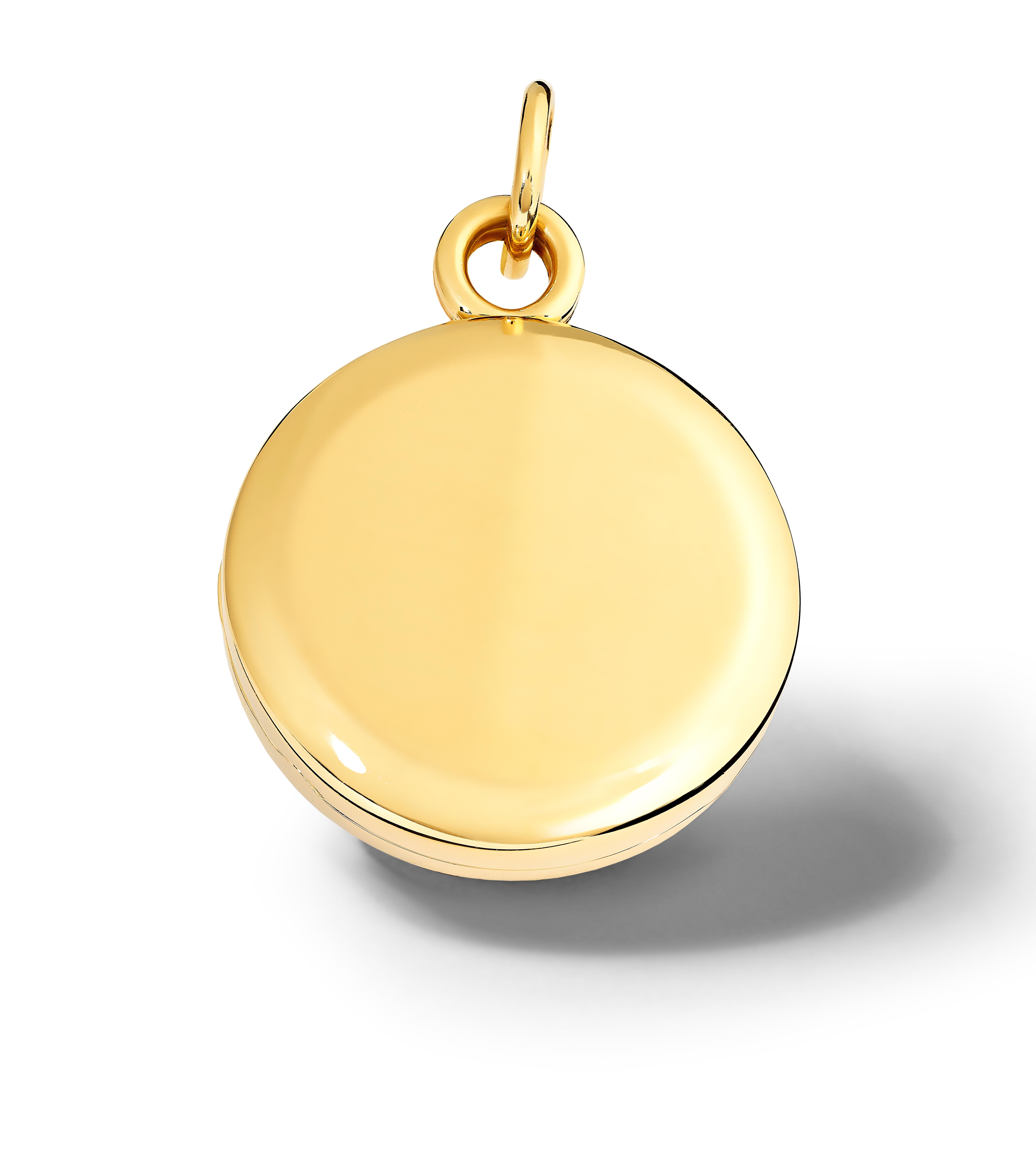 Annie necklace pendant locket in 9 carat yellow gold with four folding compartments for photographs.

Chain not included. 