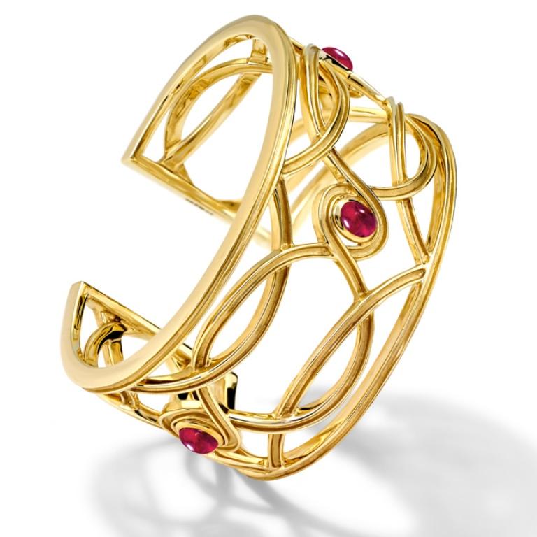 Conca d'Oro cuff in 9 carat yellow gold and set with cabochon rubies  - Inspired on a confessional in the Monreale (Murriali in Sicilian) cathedral, Palermo built in 1174 by William II of Sicily. The Cathedral looks out over the Conca d'Oro (Golden