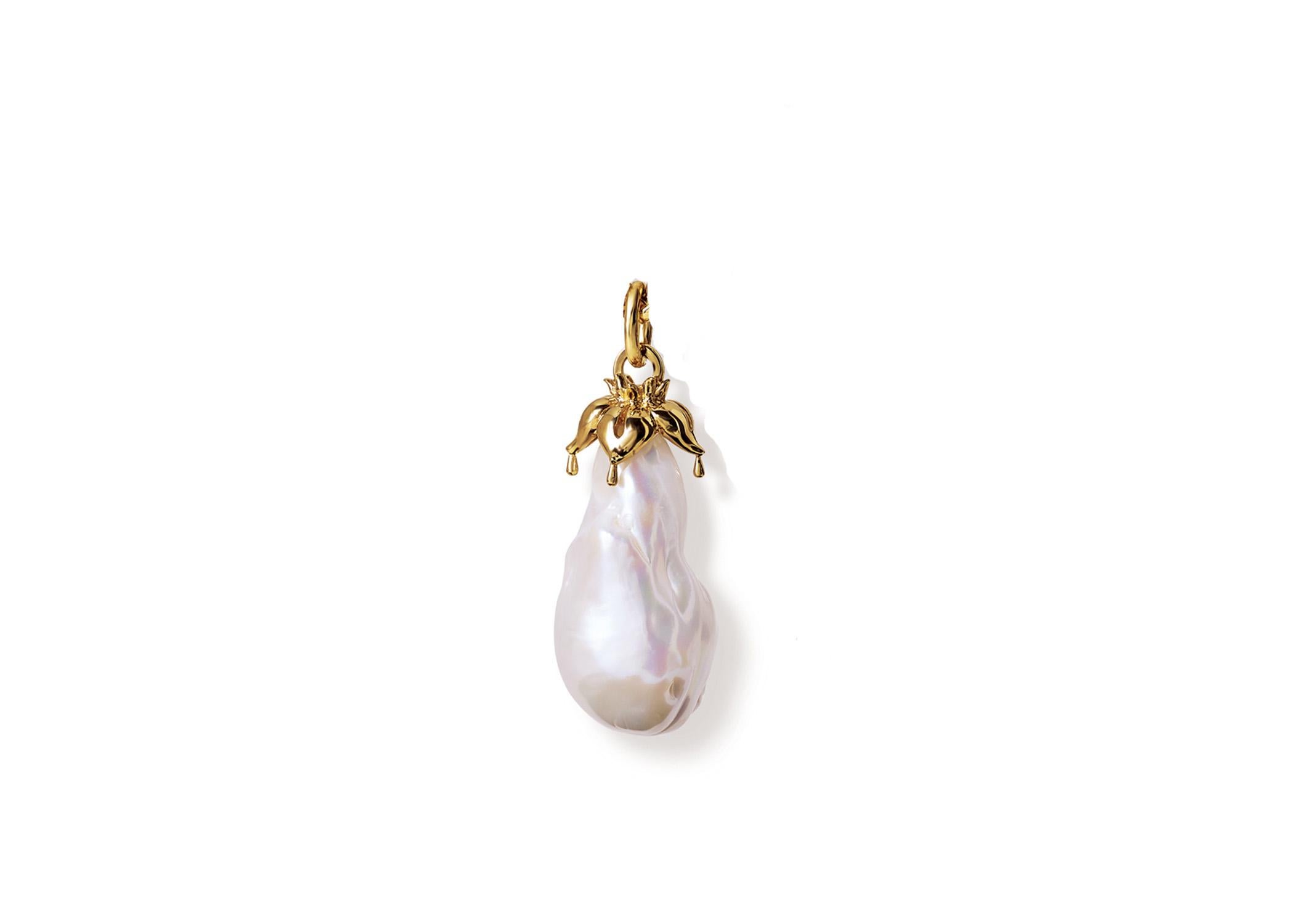 Iris necklace pendant in 9 karat yellow gold set with an exceptionally large baroque fresh water pearl. Inspired by the Japanese Iris flowers. From the Journey to Japan.

Pendant measures approximately 30mm

Chains sold separately. 