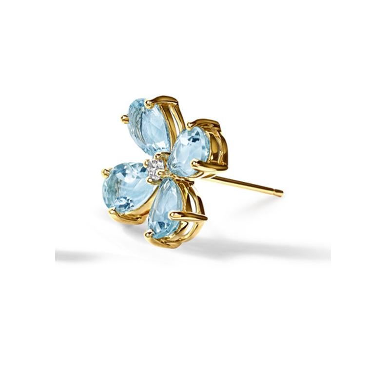 Small Klover earrings in 9ct yellow gold set with facetted pear shape pale blue topaz and diamonds. Inspired by the four leaf Clover - the first leaf is for faith, the second is for hope, the third is for love, and the fourth is for luck. From the