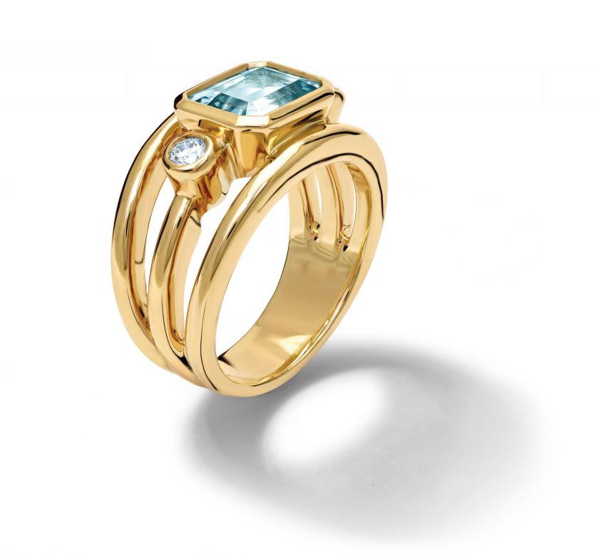 Aeneus ring in 18ct yellow gold set with facetted emerald cut vibrant blue aquamarine and diamonds.