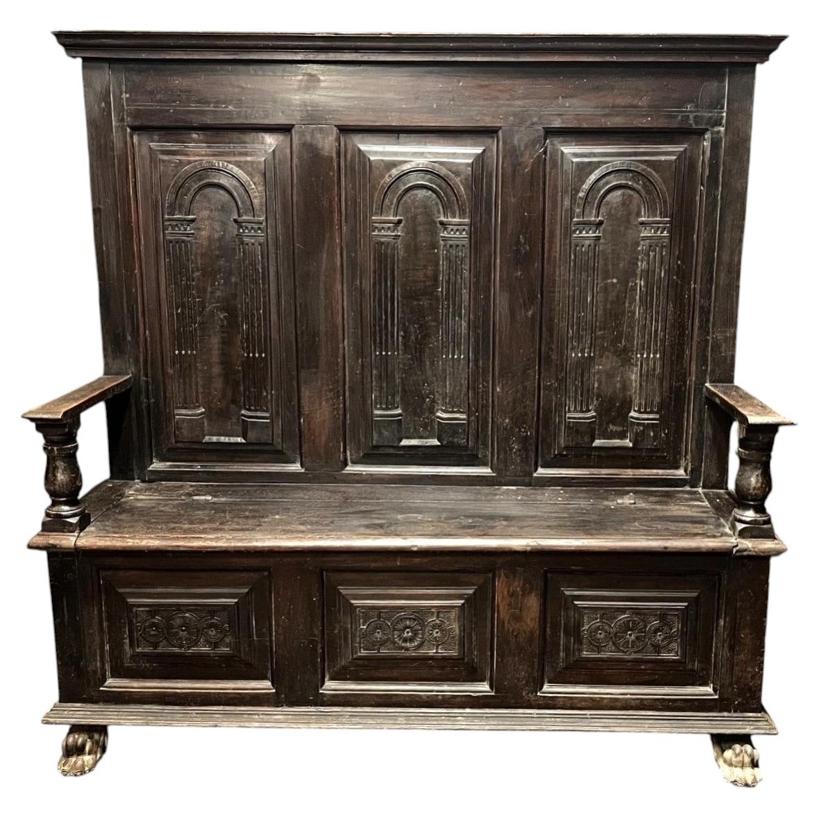 High-backed walnut chest, 16th century.