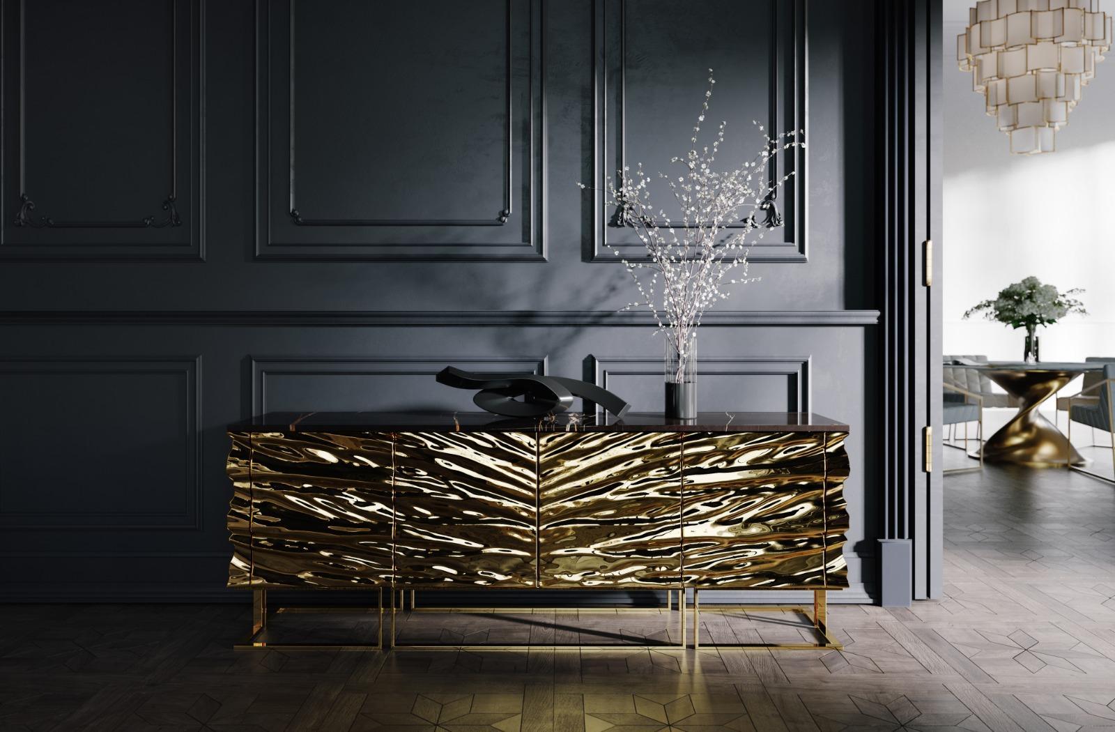 Casse Premium sideboard in metallised leather marble by Mansi London.

Sideboard with an amazing 3D effect with a wave pattern reminiscent of sculptures.
On the top is a slab of natural stone, signed with 24 KT gold plated logo.
The use of
