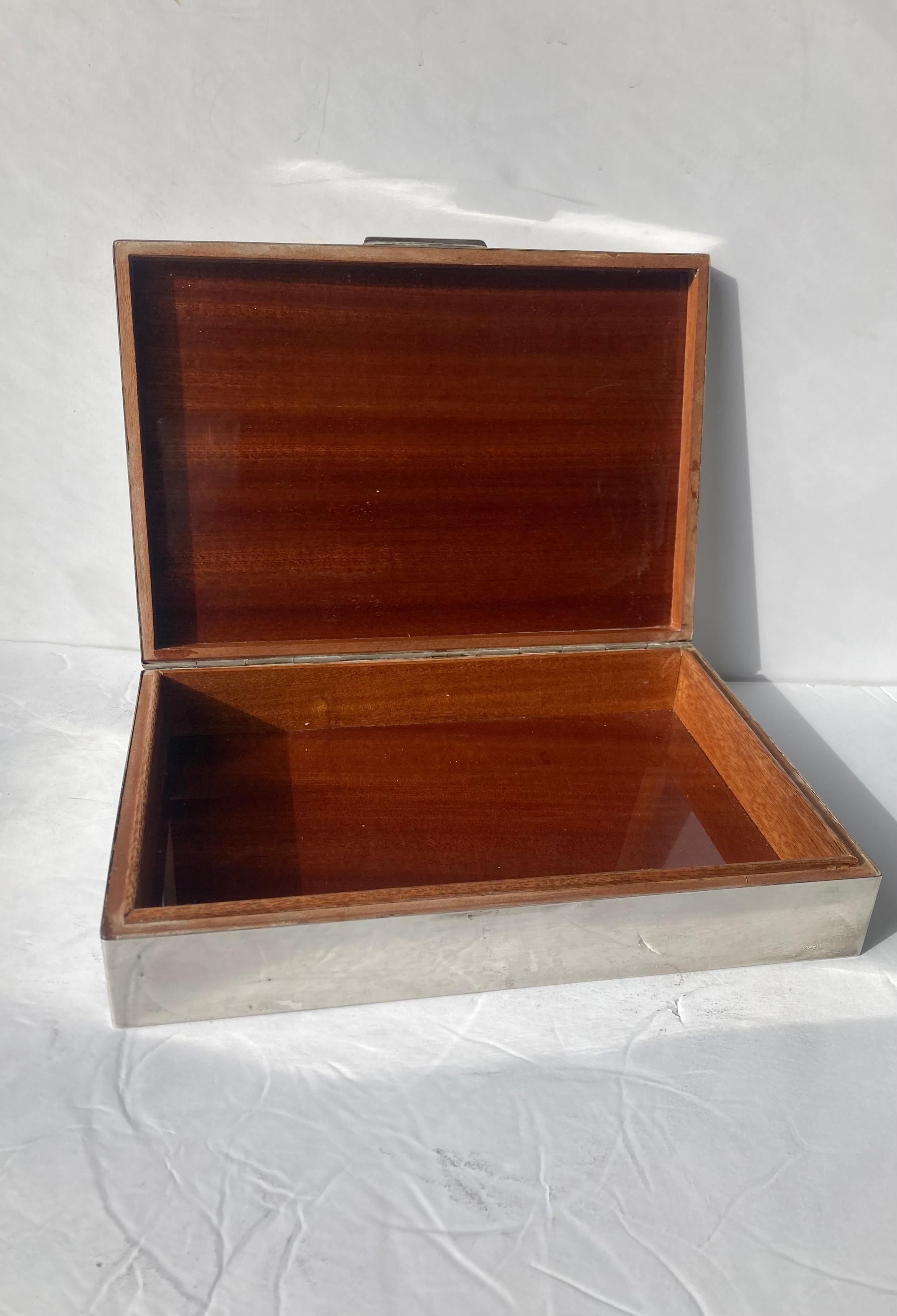 Beautiful large sterling silver box by Cassetti, marked. Nice wood lining.