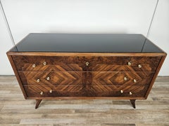 1950 chest of drawers with glass top, maple work and brass knobs