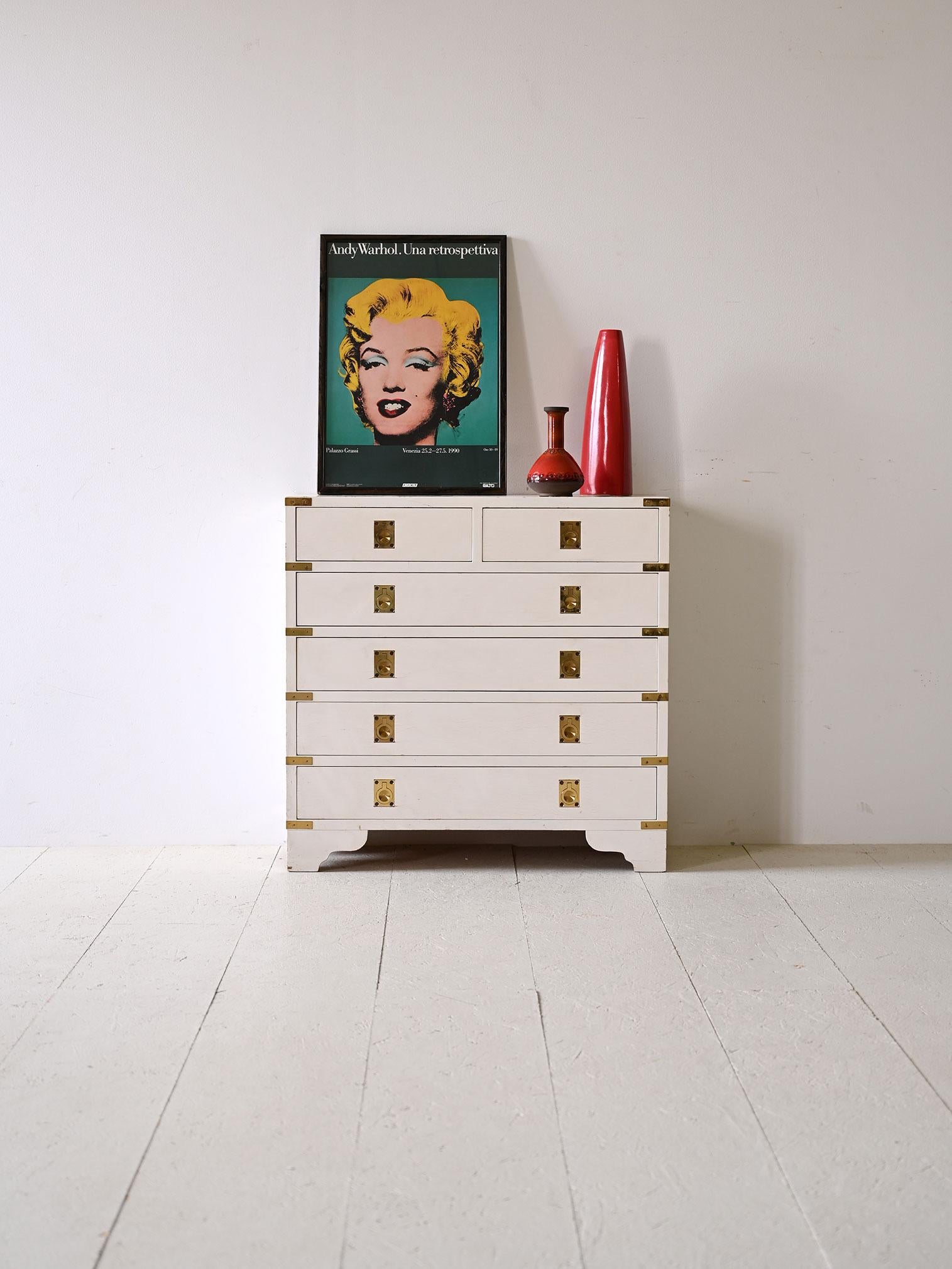 Original vintage Scandinavian white chest of drawers.

A bright and elegant addition to any space, this white-painted wooden dresser traces Nordic style with sophistication. Its clean and minimal lines, combined with the light color, create a bright