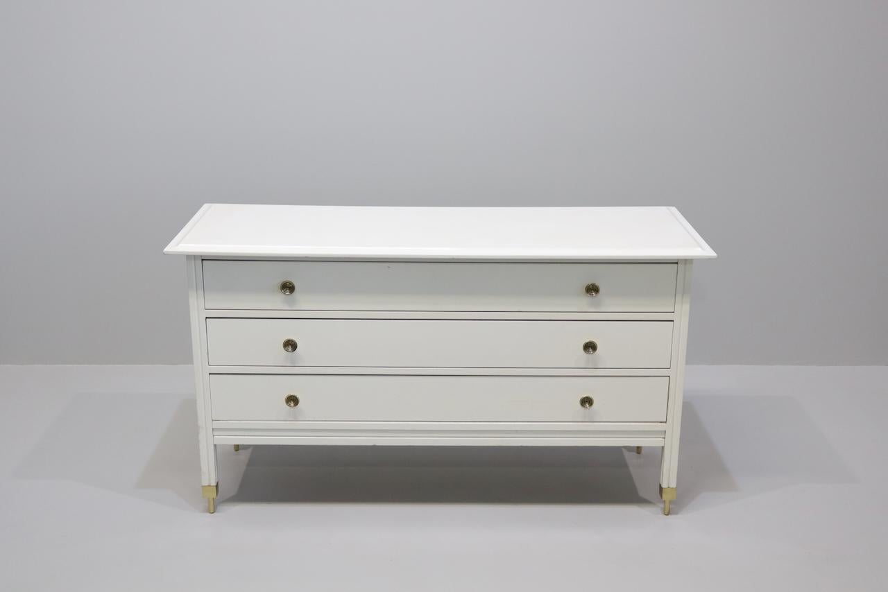 Carlo De Carli (Milan, 1910 - 1999) Drawer chest model D154 in white lacquered wood, brass knobs and prongs Manufacturing Sormani, Italy, 1963  
Italian Mid-Century Dresser by the famous Italian Architect and designer Carlo de Carli, Sormani