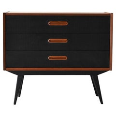 Cassettiera scandinava anni 60 in teak con inserti neri