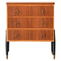Scandinavian chest of drawers with metal handles