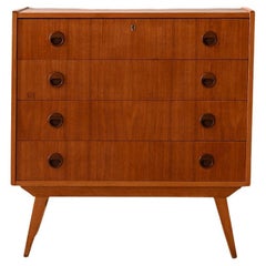Vintage teak chest of drawers with round handles