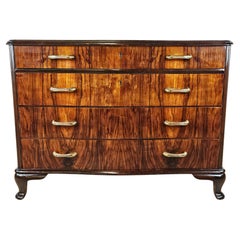 Burl chest of drawers with brass handles and decorated plastic