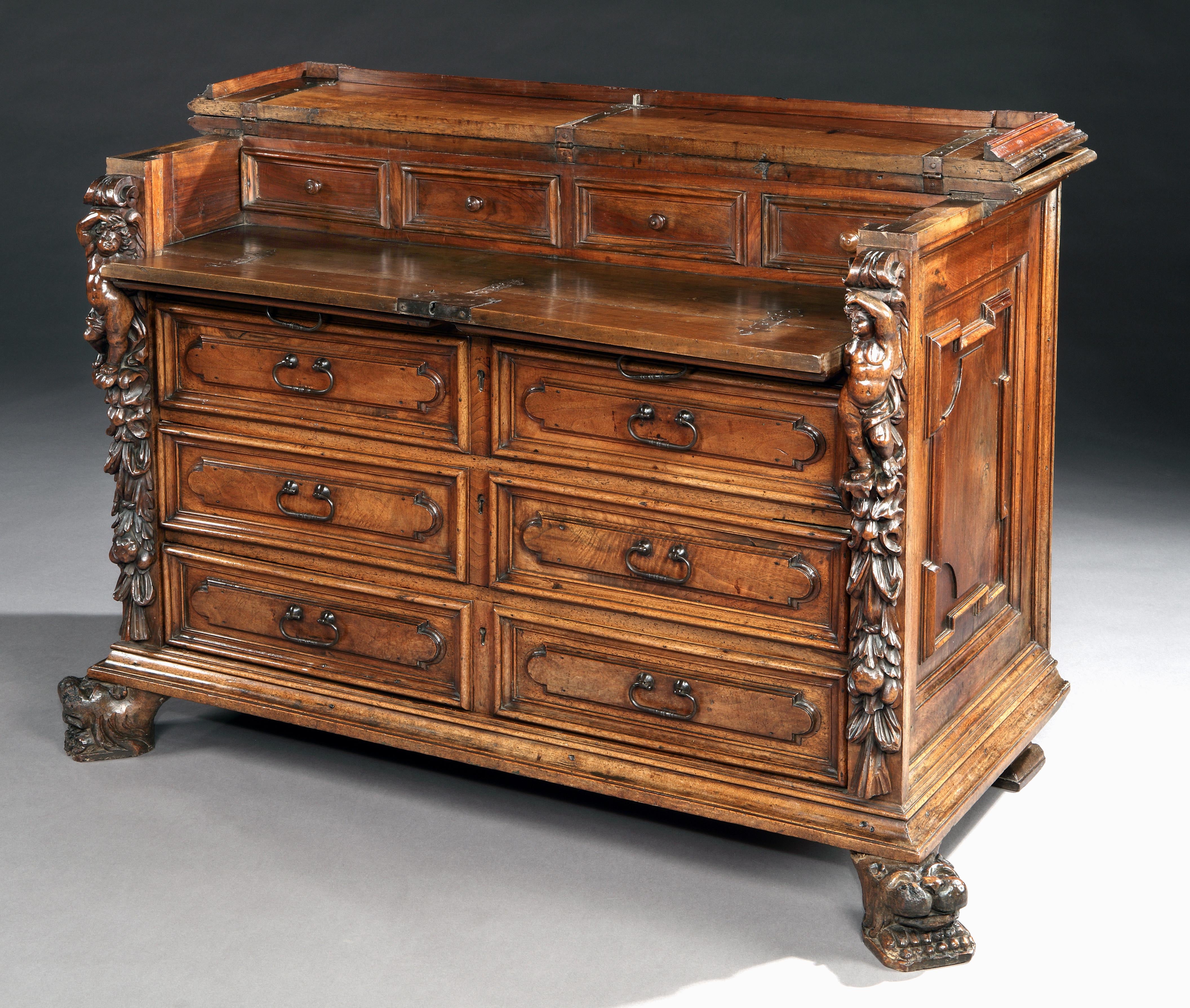 Exceptional museum quality, Italian, renaissance walnut cassettone with fitted bureau in the upper part & exceptional Bambocci carving, Lombardy.

This magnificent cassettone exudes the character and quality of the finest, late-Renaissance