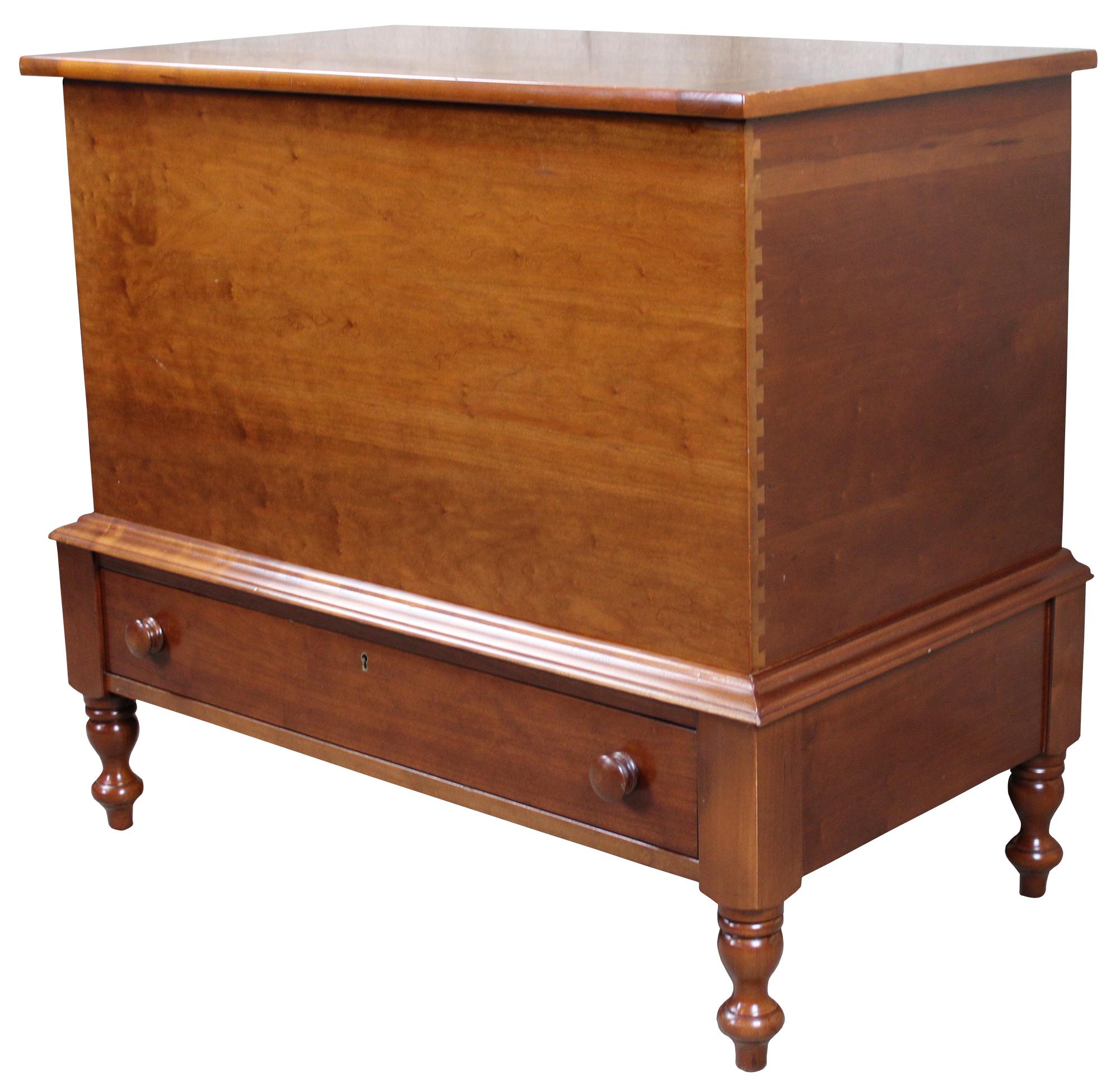 Vintage Cassady Furniture Co solid cherry blanket mule chest. An early American reproduction with dovetailing along the sides. Features a lower drawer and turned arrow point legs. Cassady Furniture is out of Bowling Green Kentucky, circa 1980s.
  