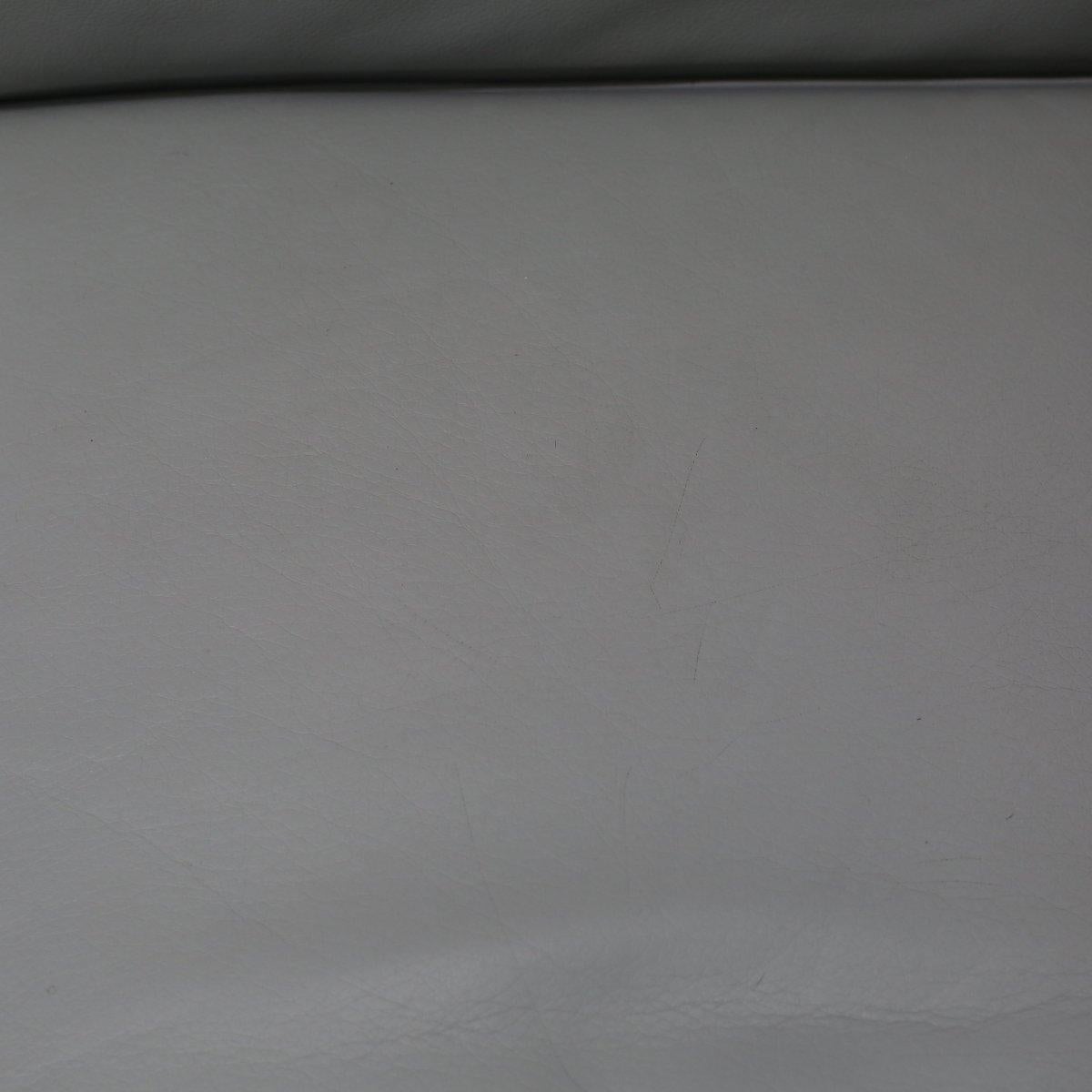 Introducing the 3 Fauteuil Grand Confort Sofa by Cassina. Crafted with meticulous precision and high-quality materials, this iconic piece embodies elegance and timeless sophistication. Designed with a striking chrome-plated frame and plush leather